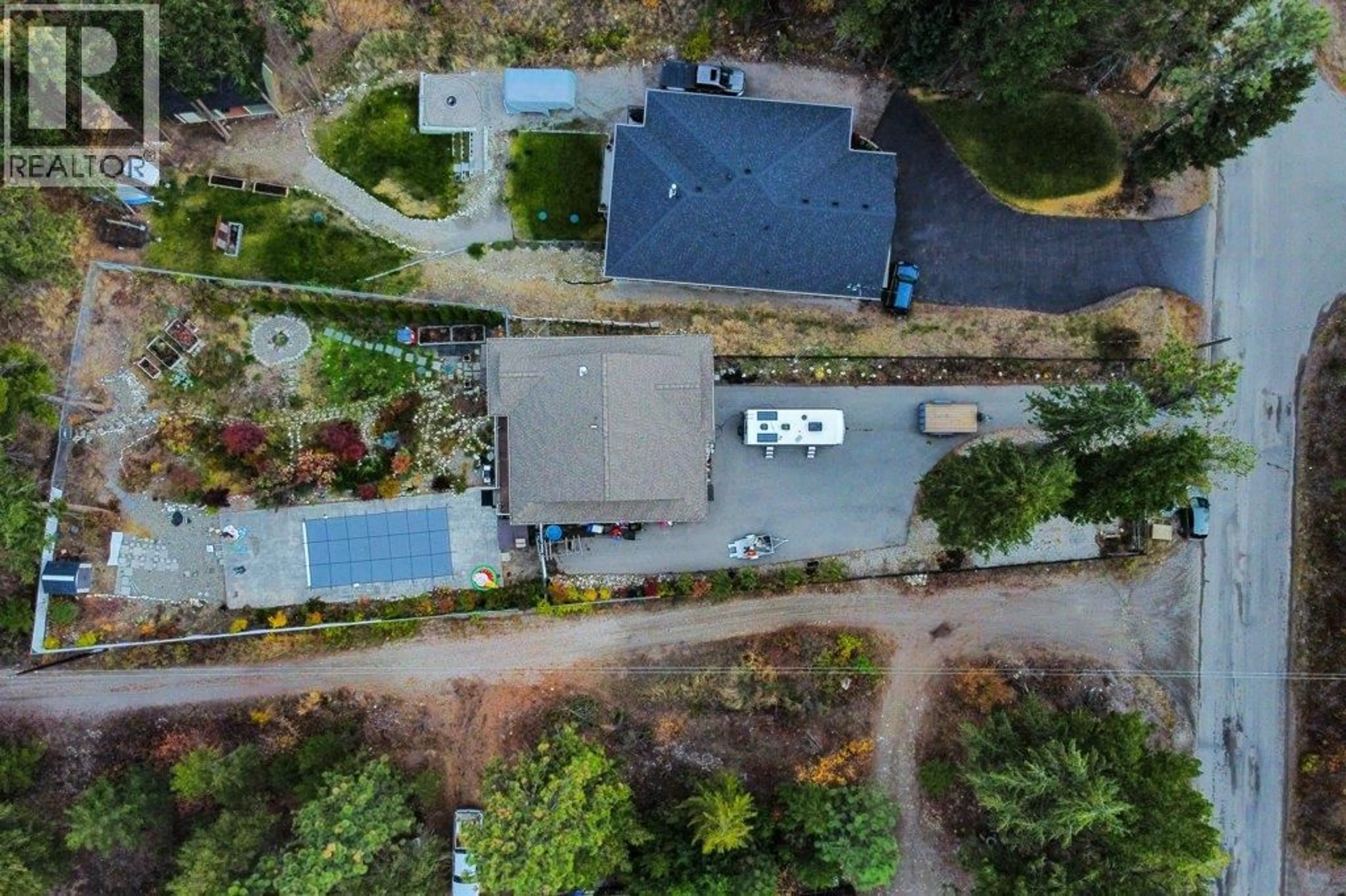 A pic from outside/outdoor area/front of a property/back of a property/a pic from drone, unknown for 750 FIRWOOD ROAD, Kelowna British Columbia V1Z3V5