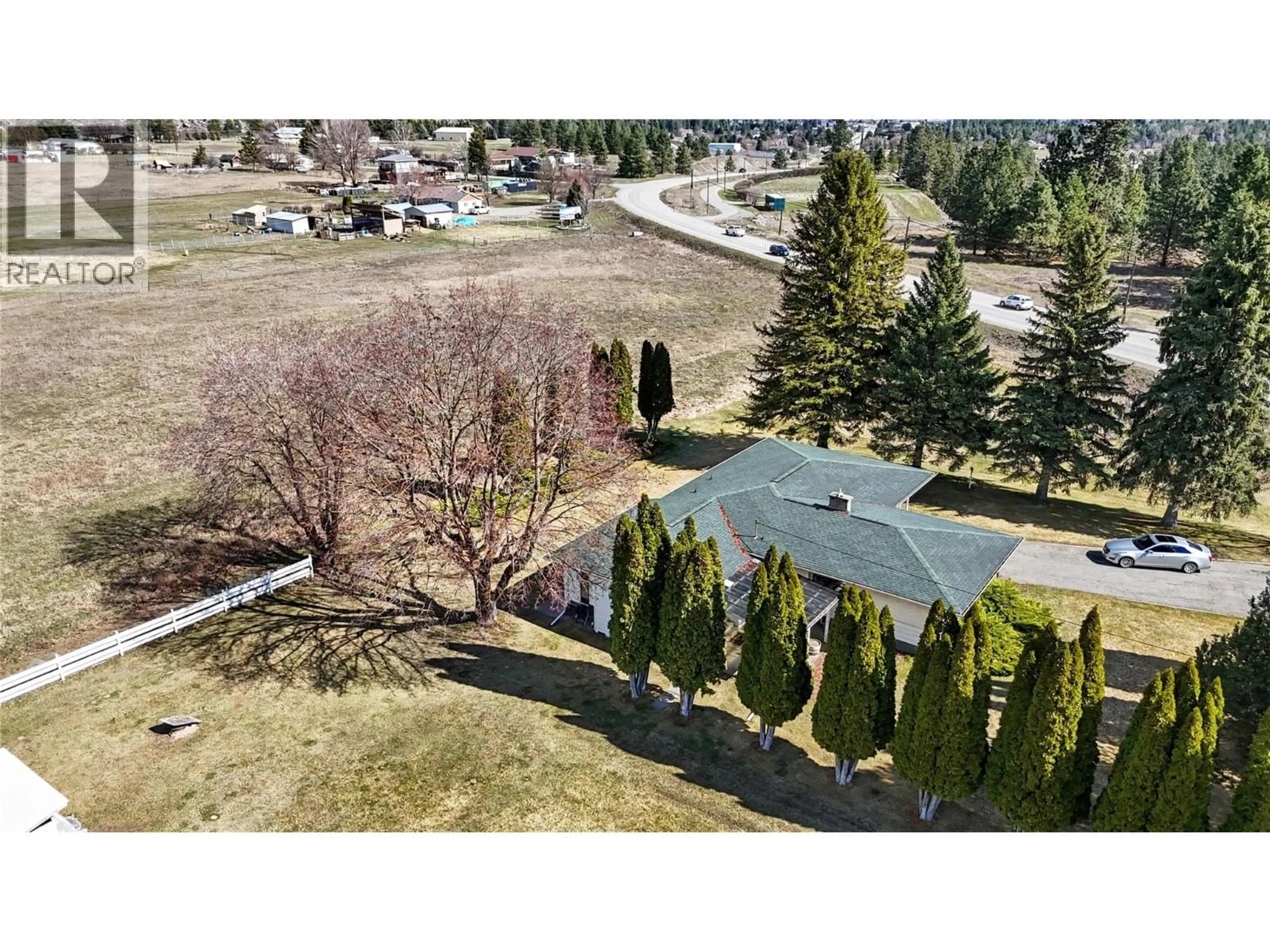 A pic from outside/outdoor area/front of a property/back of a property/a pic from drone, mountain view for 4065 CANNING ROAD, Grand Forks British Columbia V0H1H5