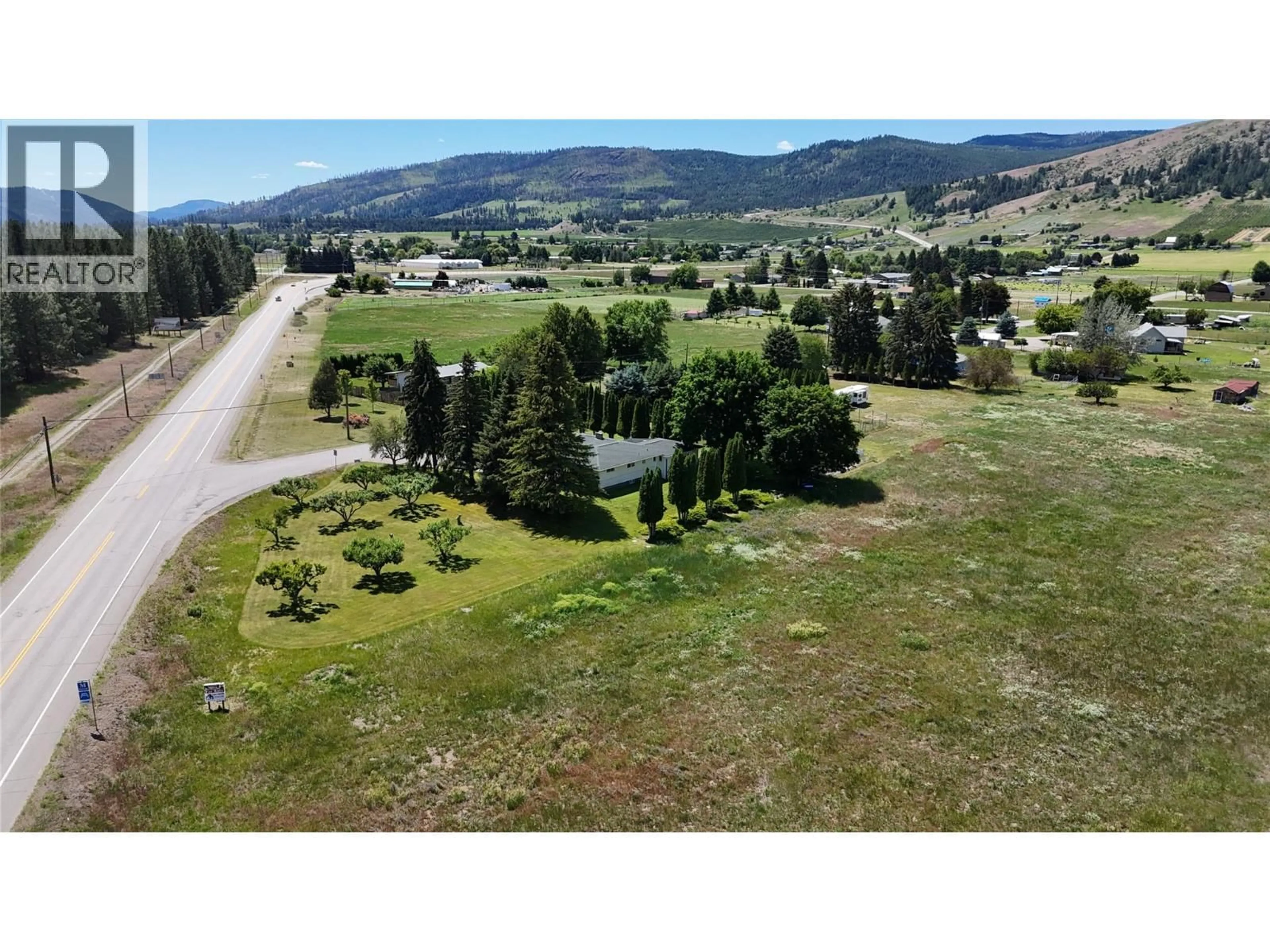 A pic from outside/outdoor area/front of a property/back of a property/a pic from drone, mountain view for 4065 CANNING ROAD, Grand Forks British Columbia V0H1H5