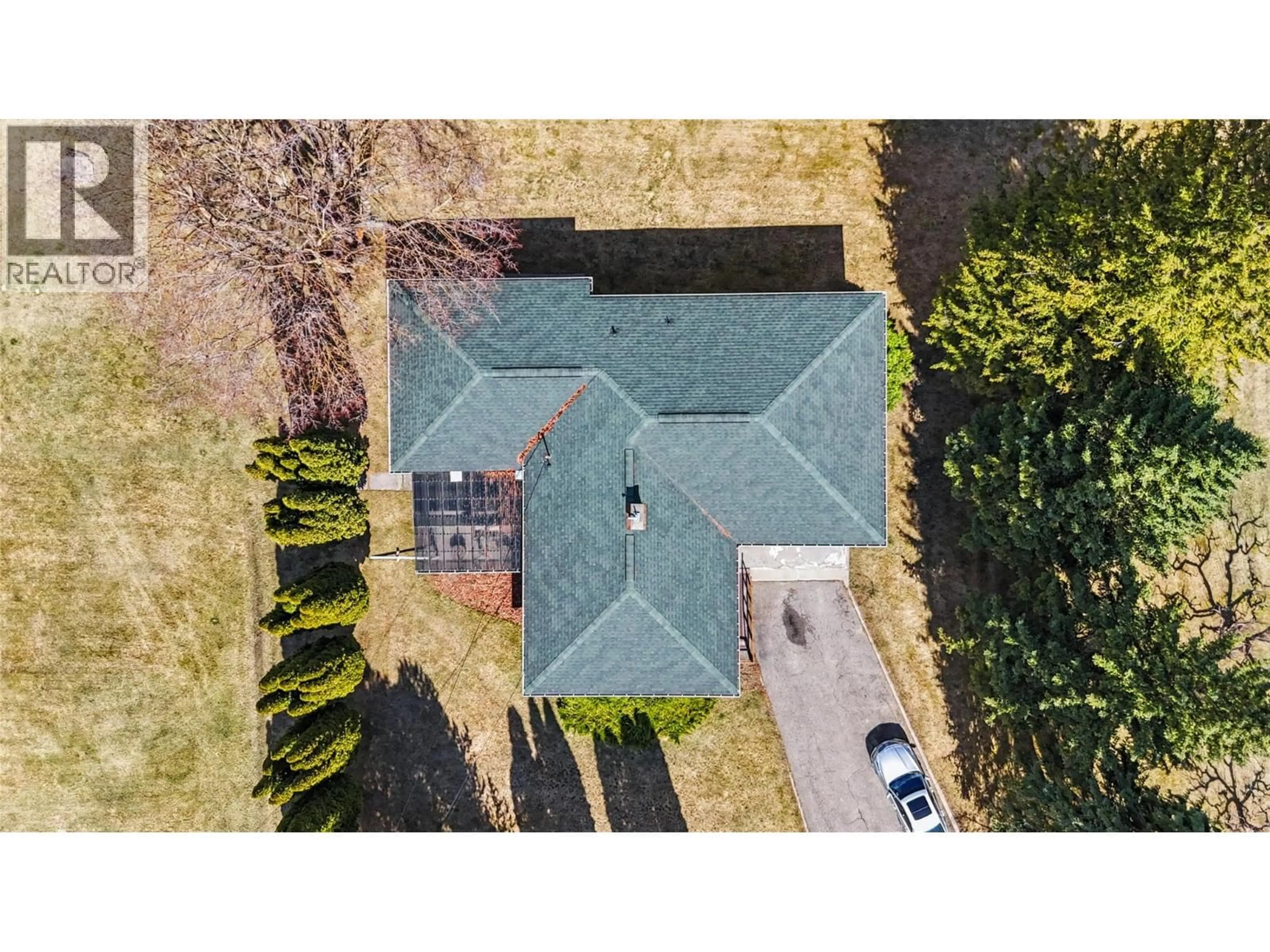 A pic from outside/outdoor area/front of a property/back of a property/a pic from drone, street for 4065 CANNING ROAD, Grand Forks British Columbia V0H1H5