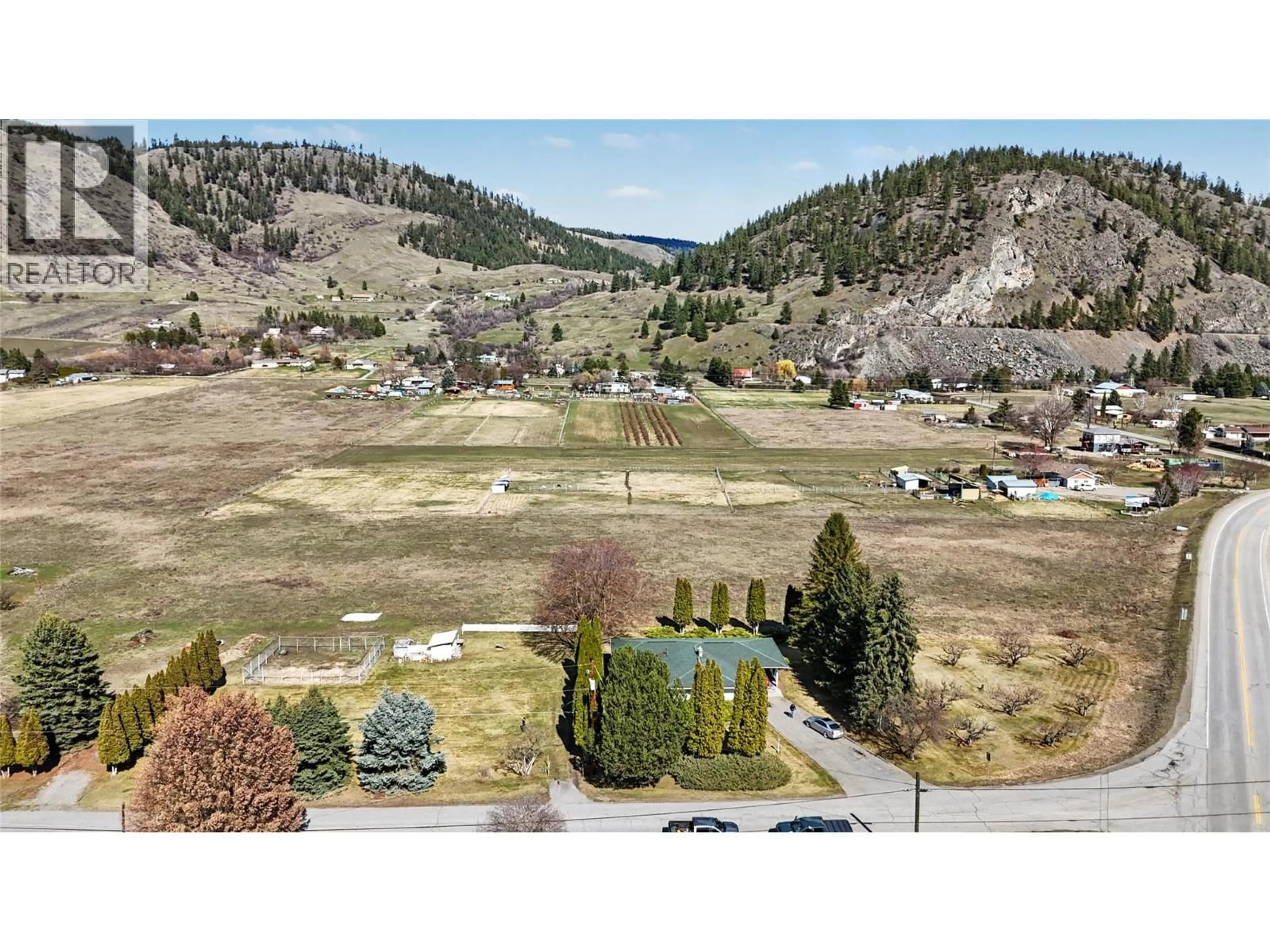 A pic from outside/outdoor area/front of a property/back of a property/a pic from drone, mountain view for 4065 CANNING ROAD, Grand Forks British Columbia V0H1H5
