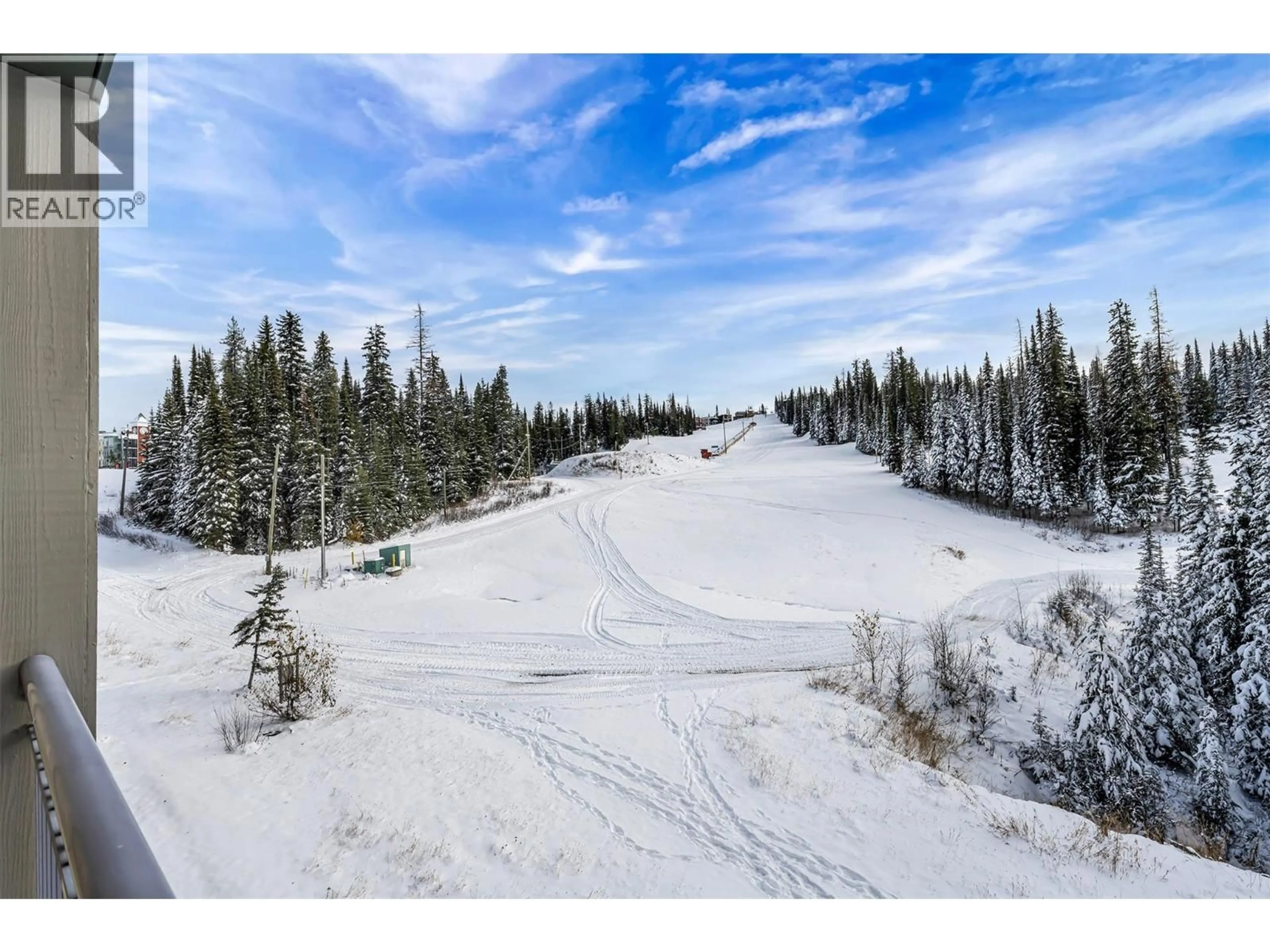 A pic from outside/outdoor area/front of a property/back of a property/a pic from drone, forest/trees view for 306 - 9810 SILVER STAR ROAD, Silver Star British Columbia V1B3X5