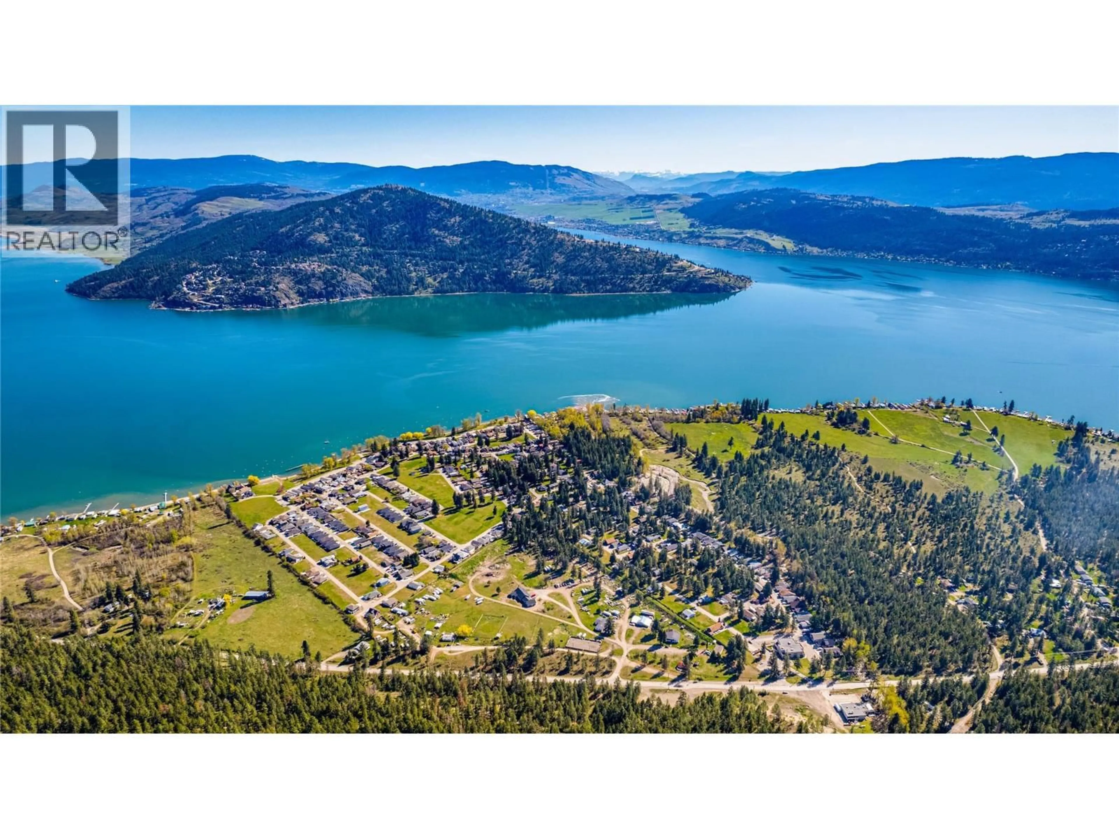 A pic from outside/outdoor area/front of a property/back of a property/a pic from drone, water/lake/river/ocean view for 223 COUGAR STREET, Vernon British Columbia V1H2A1
