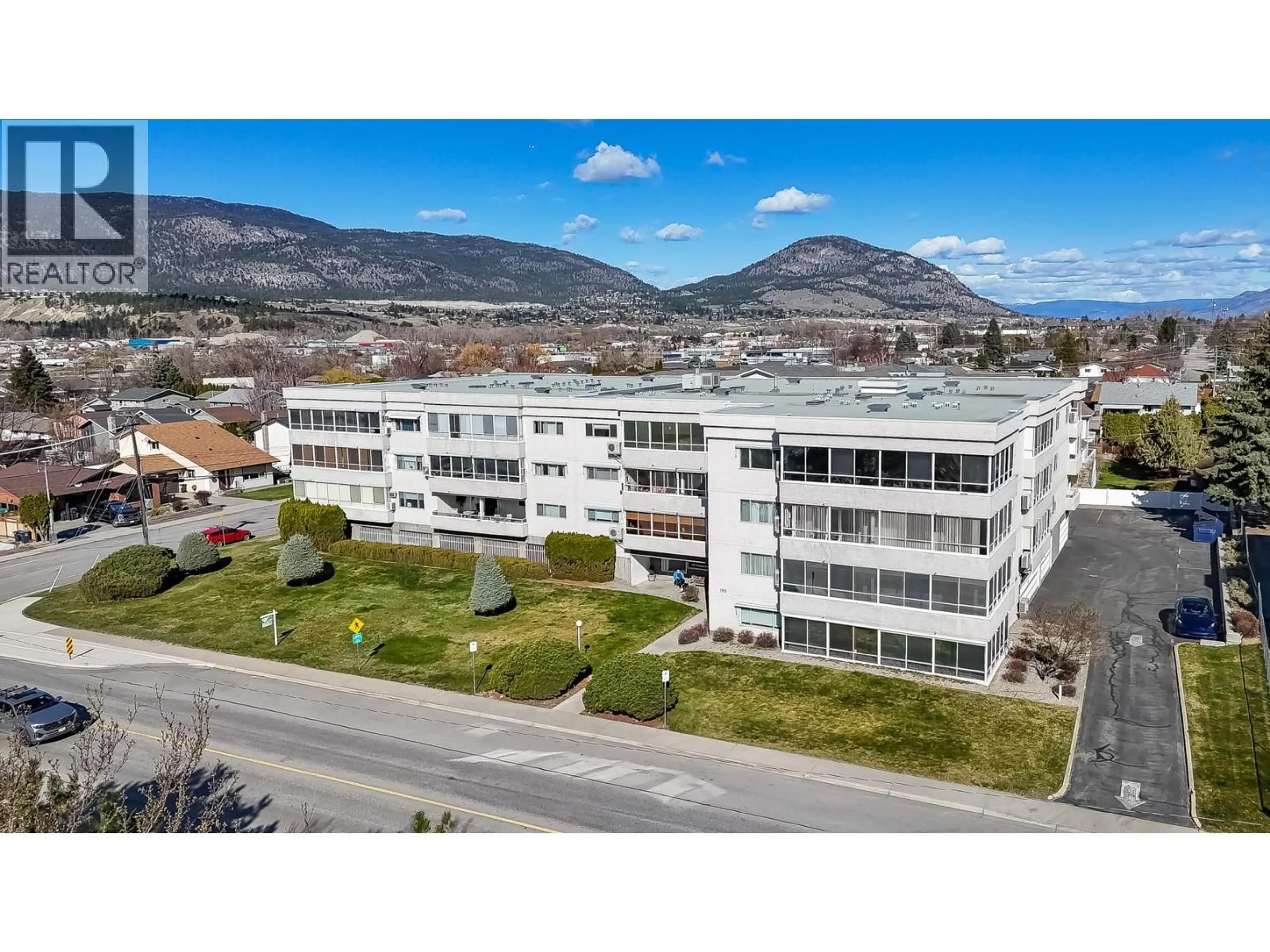 A pic from outside/outdoor area/front of a property/back of a property/a pic from drone, mountain view for 209 - 195 WARREN AVENUE, Penticton British Columbia V2A3N1