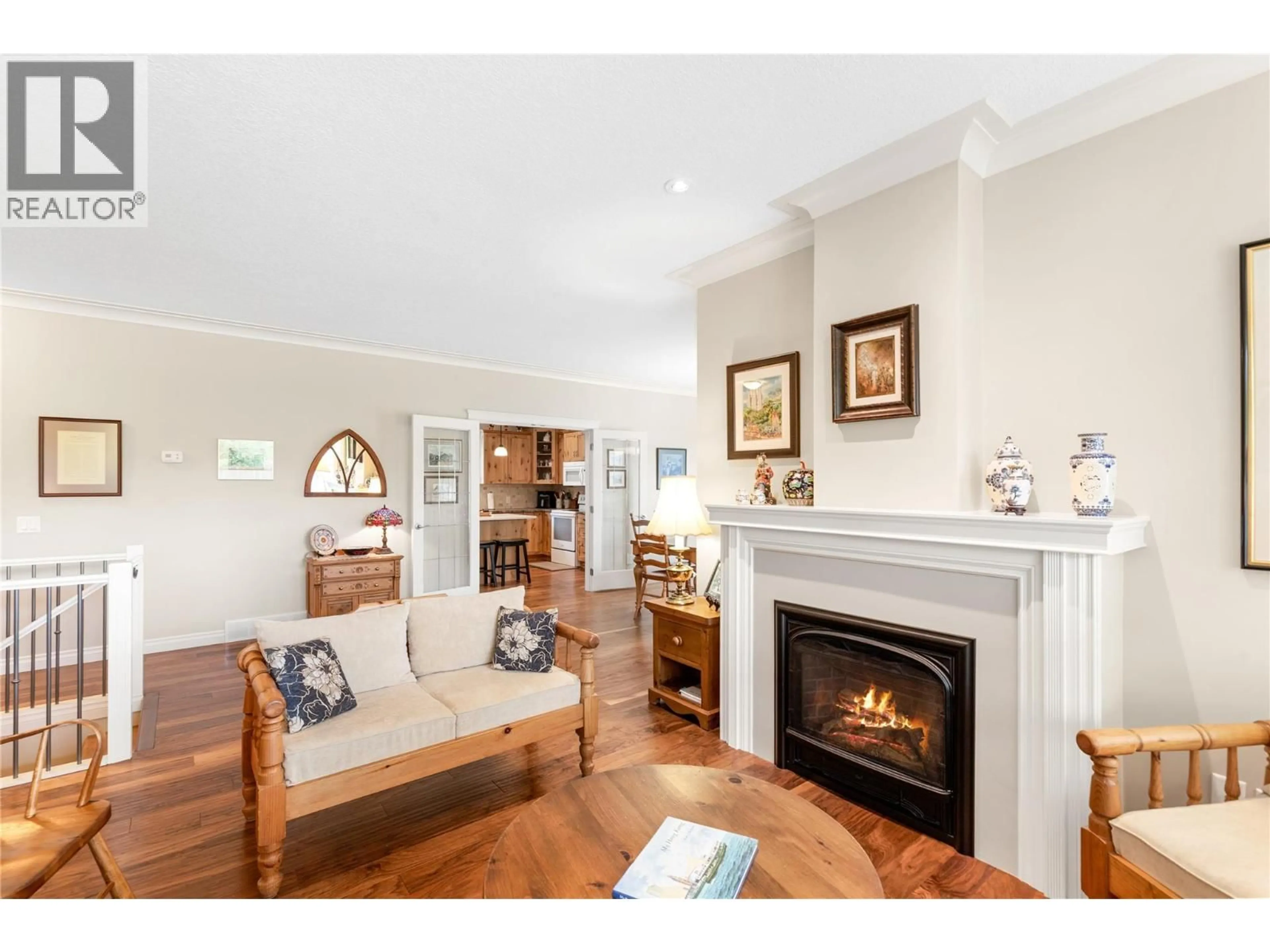 Living room with furniture, wood/laminate floor for 2750 SUNNYDALE DRIVE, Blind Bay British Columbia V0E1H2