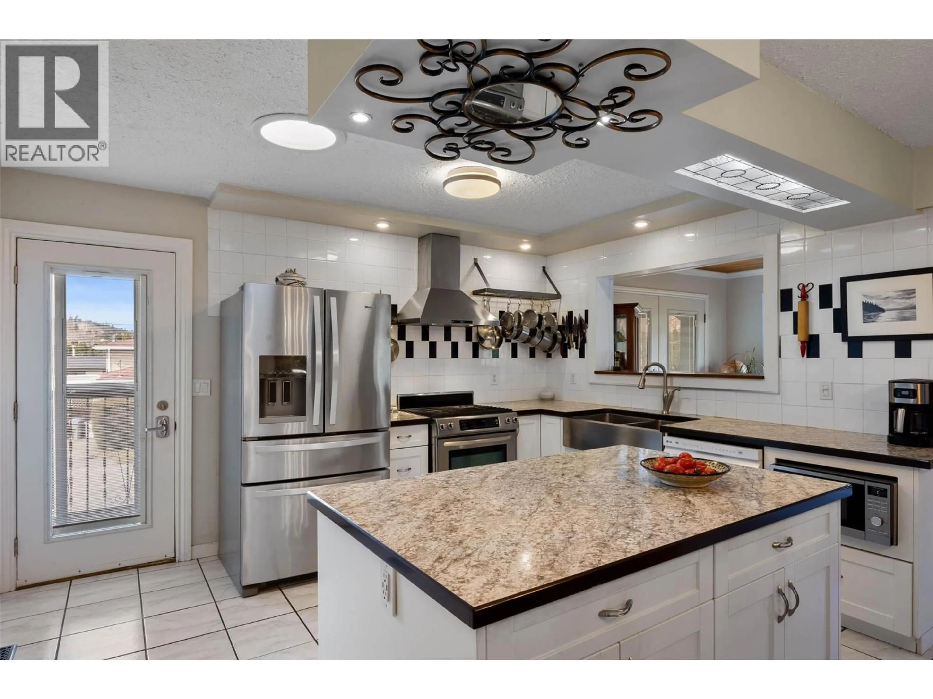 Open concept kitchen, ceramic/tile floor for 381 MARY PLACE, Kamloops British Columbia V2C4Y5