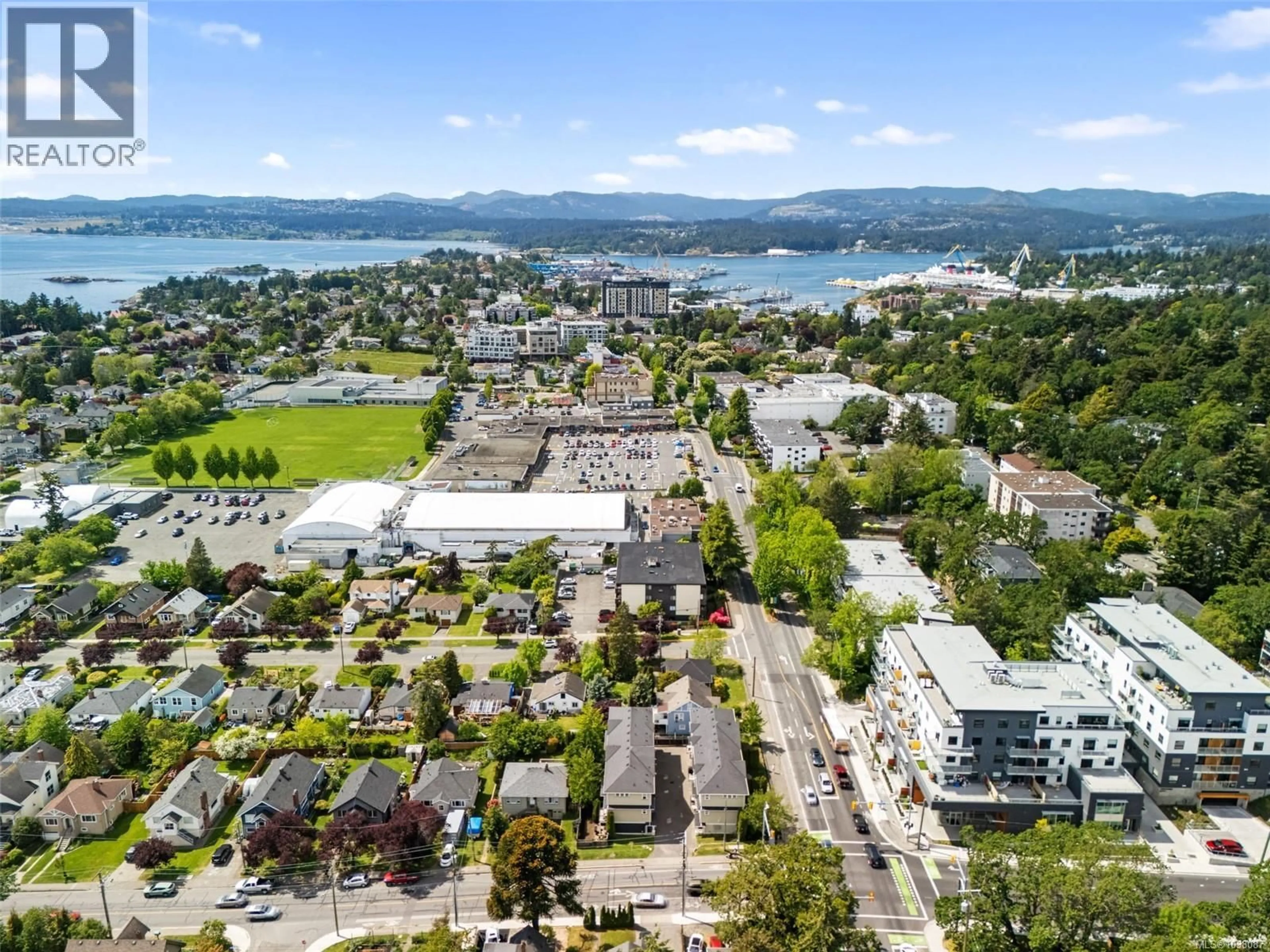 A pic from outside/outdoor area/front of a property/back of a property/a pic from drone, mountain view for 4 - 1105 ESQUIMALT ROAD, Esquimalt British Columbia V9A3N5