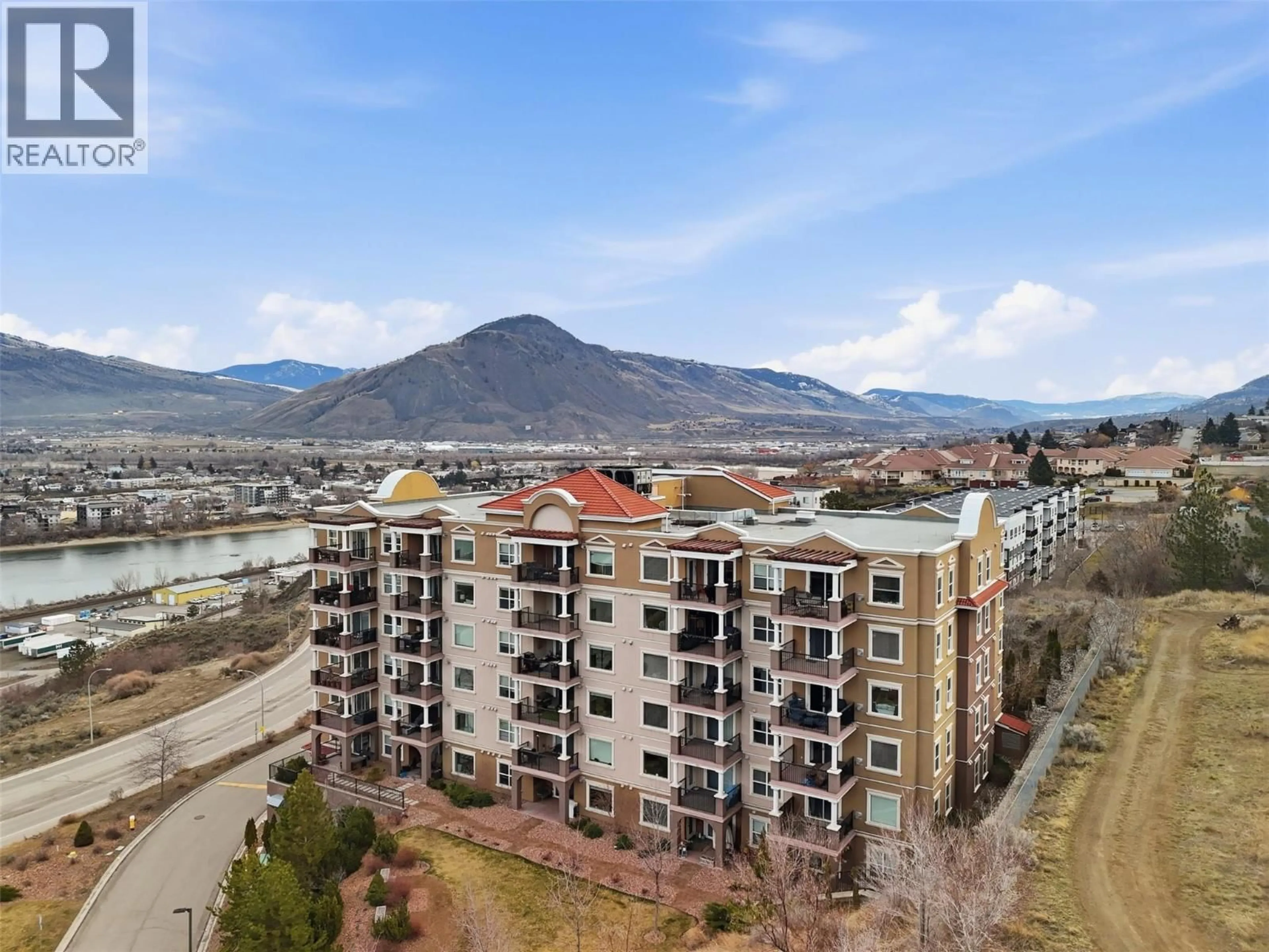 A pic from outside/outdoor area/front of a property/back of a property/a pic from drone, mountain view for 608 - 975 VICTORIA W STREET, Kamloops British Columbia V2C0C2