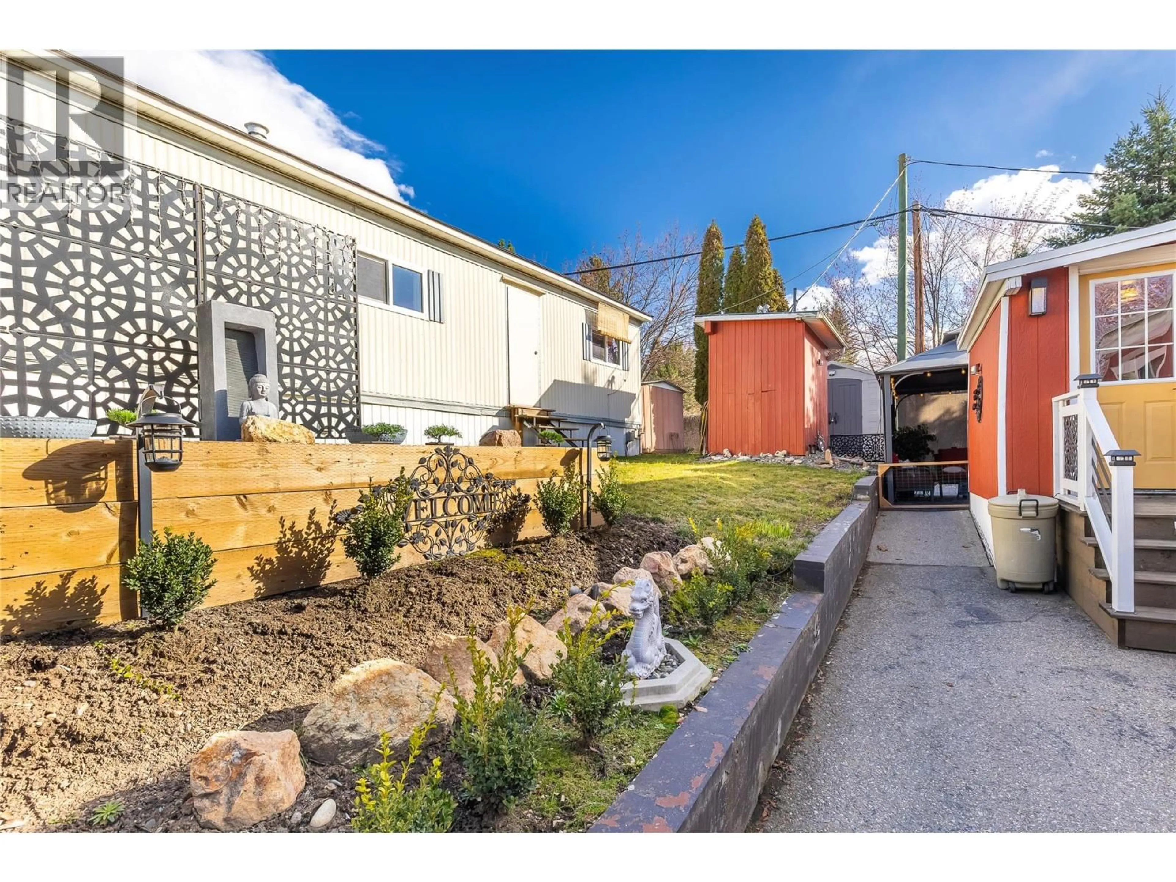 A pic from outside/outdoor area/front of a property/back of a property/a pic from drone, street for 98 - 15401 KALAMALKA LAKE ROAD, Vernon British Columbia V1B1Z3