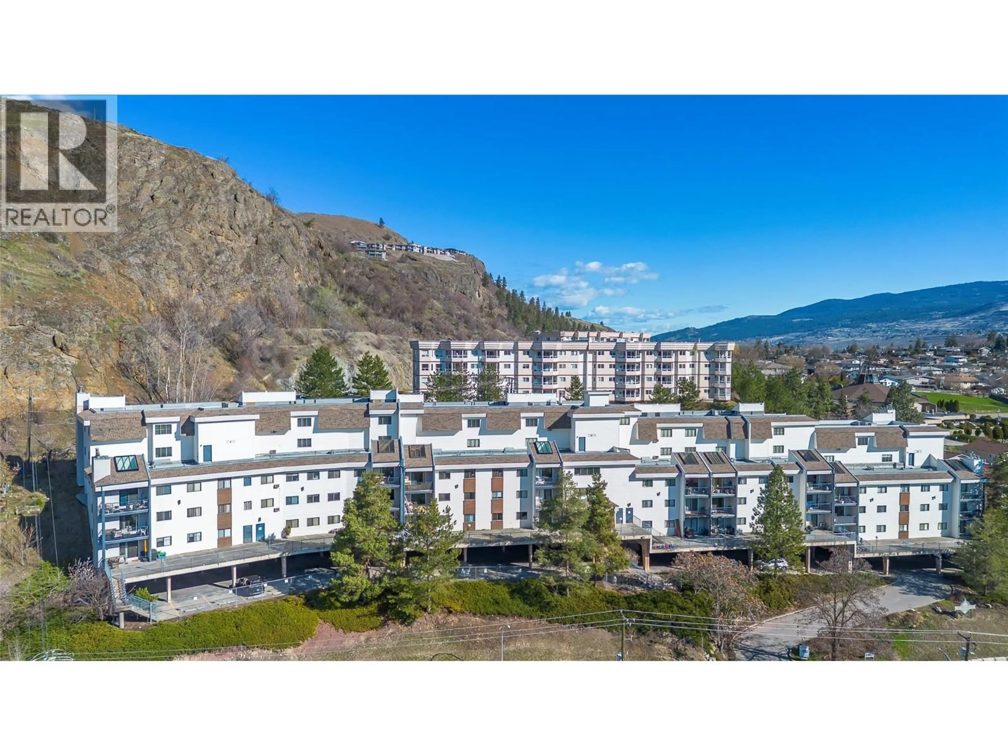 A pic from outside/outdoor area/front of a property/back of a property/a pic from drone, mountain view for 519 - 3901 32 AVENUE, Vernon British Columbia V1T8M3