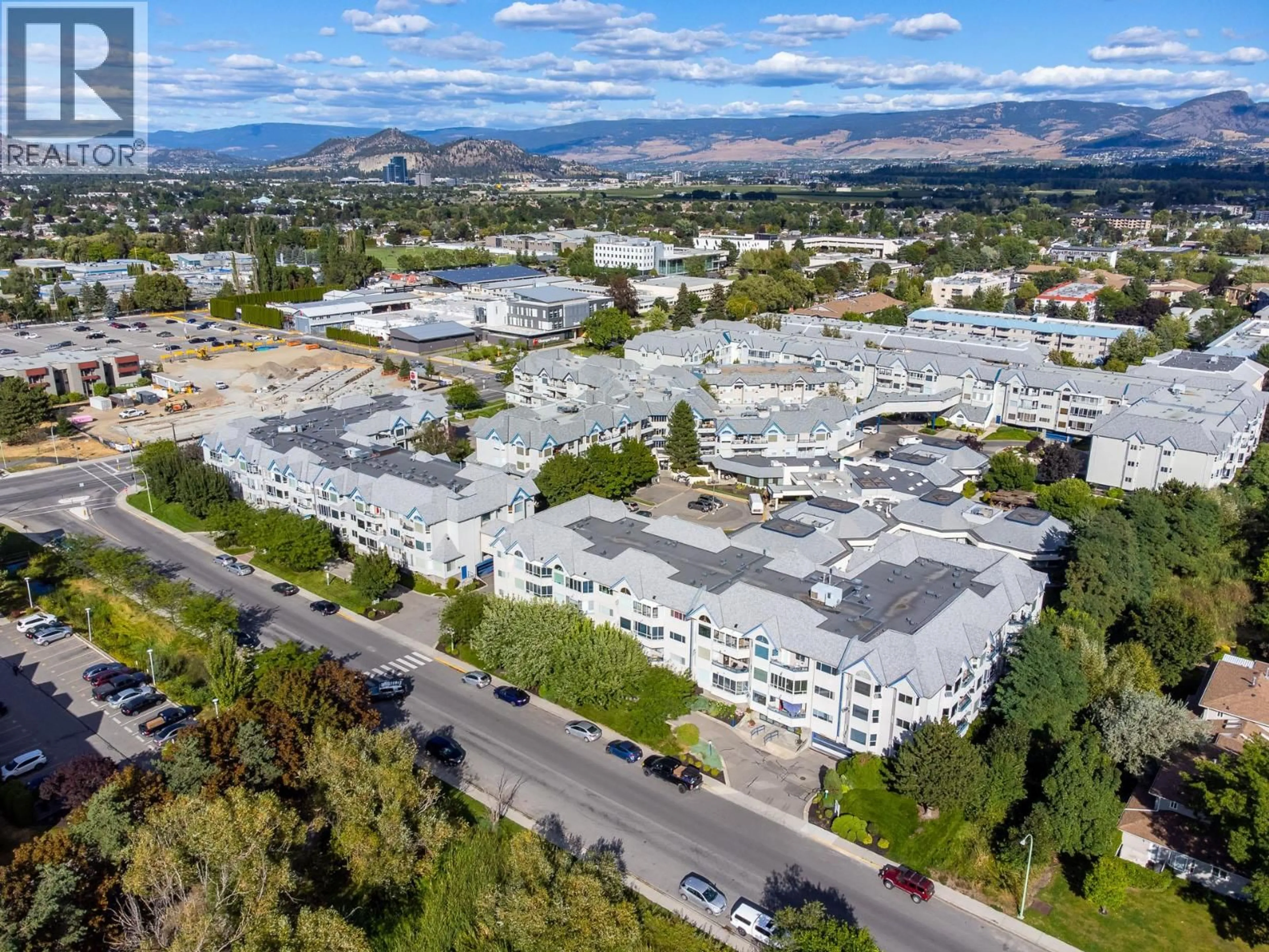 A pic from outside/outdoor area/front of a property/back of a property/a pic from drone, mountain view for 105 - 3157 CASORSO ROAD, Kelowna British Columbia V1W3J4