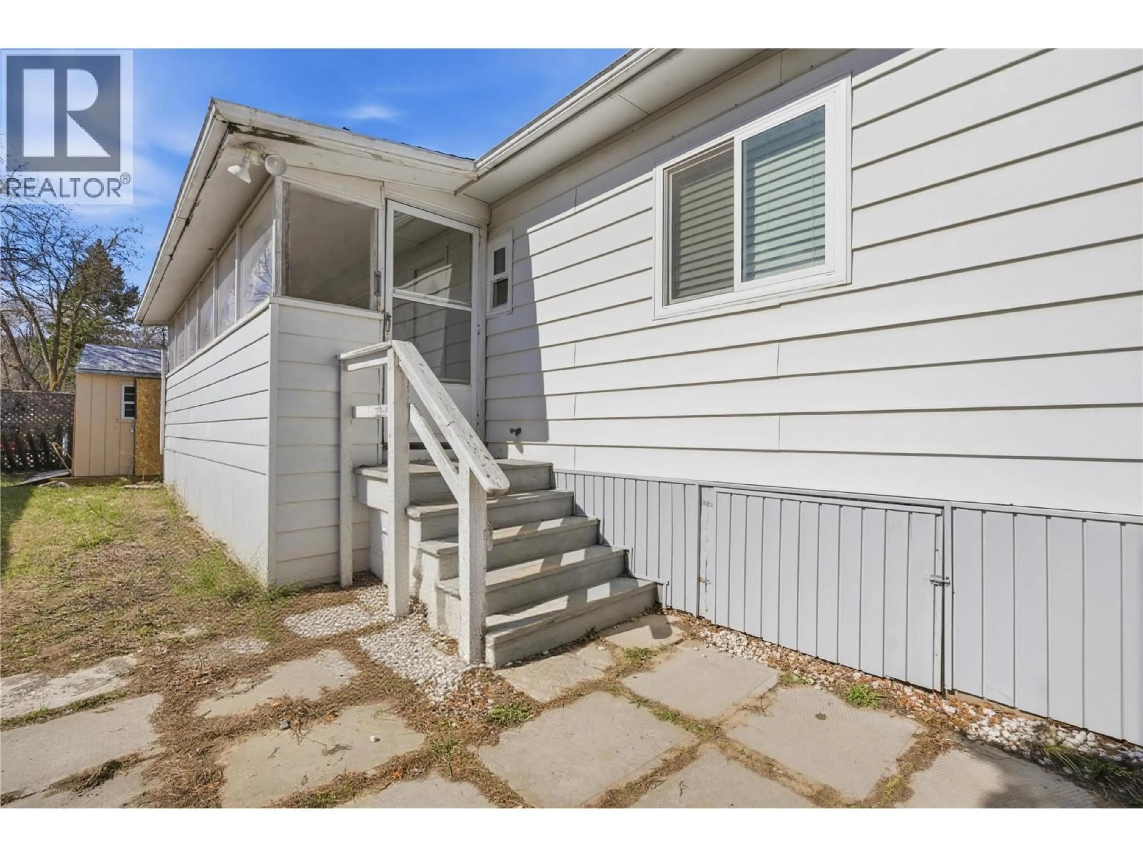 Home with vinyl exterior material, street for 26 - 159 ZIRNHELT ROAD, Kamloops British Columbia V2H0B3