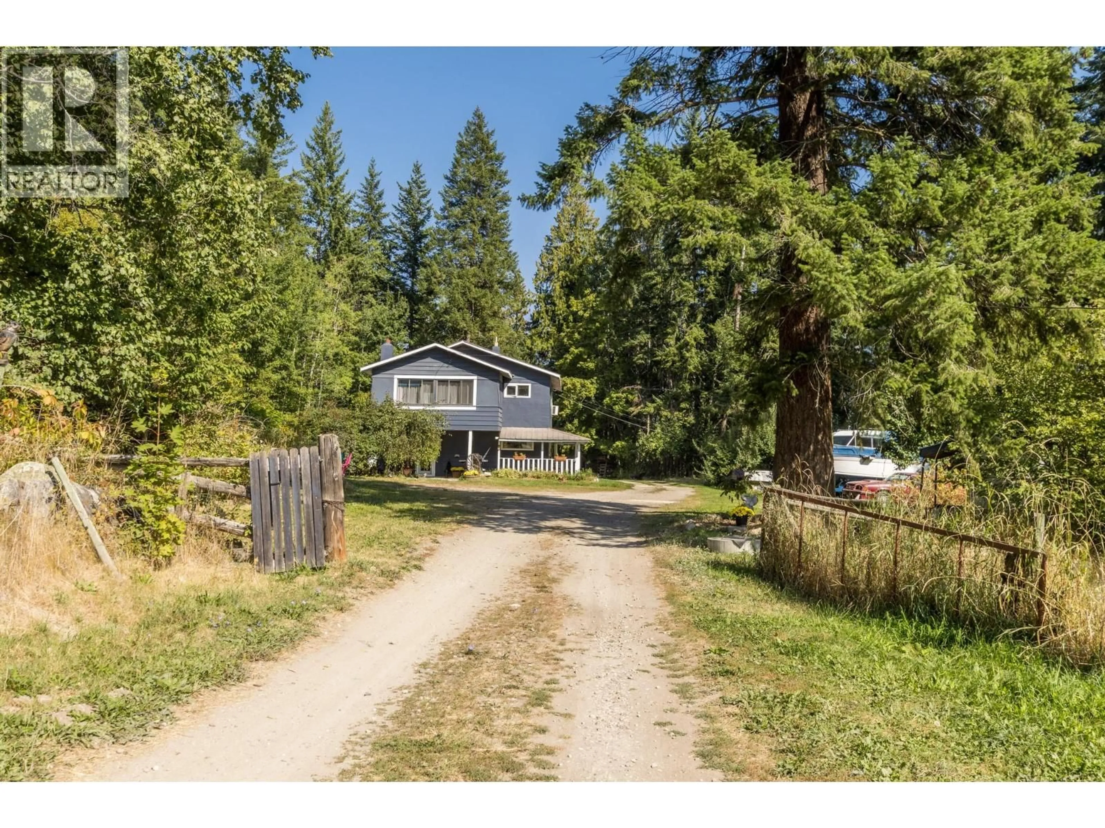 A pic from outside/outdoor area/front of a property/back of a property/a pic from drone, street for 3591 65 AVENUE NORTHWEST, Salmon Arm British Columbia V1E3A2