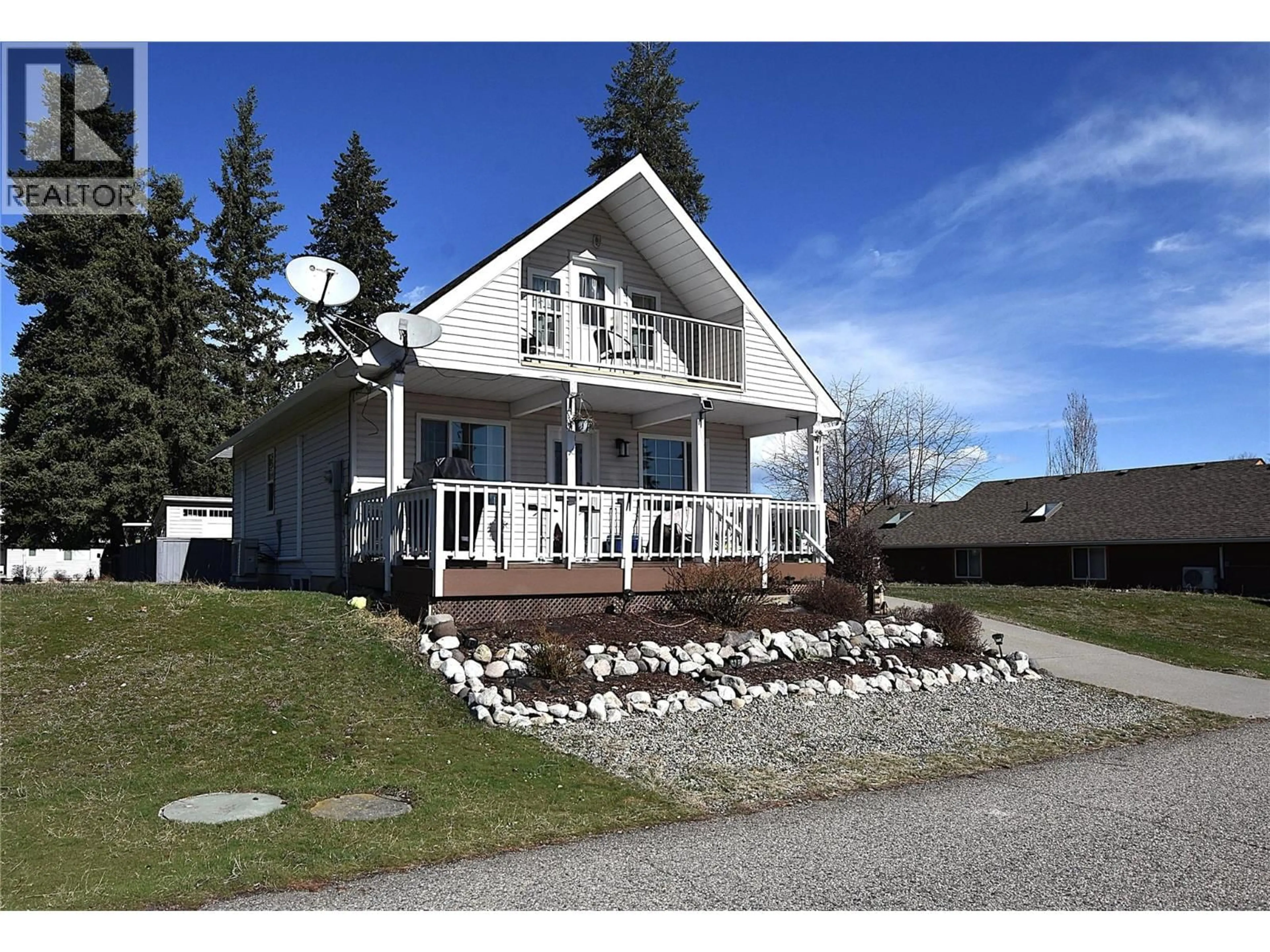 Home with vinyl exterior material, street for 441 HUMMINGBIRD AVENUE, Vernon British Columbia V1H2A1