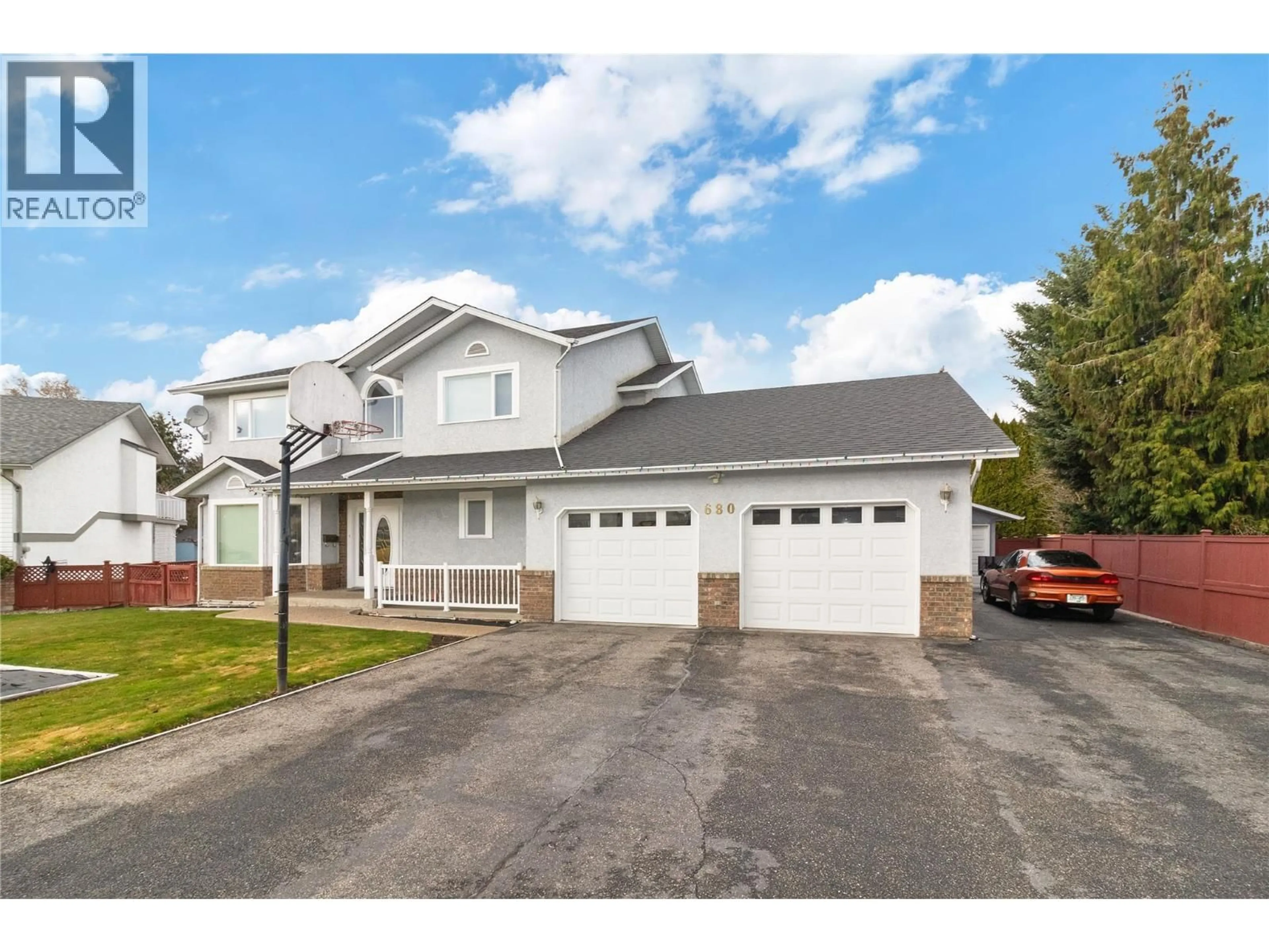 Home with vinyl exterior material, street for 680 RICHARDS ROAD, Kelowna British Columbia V1X2X6