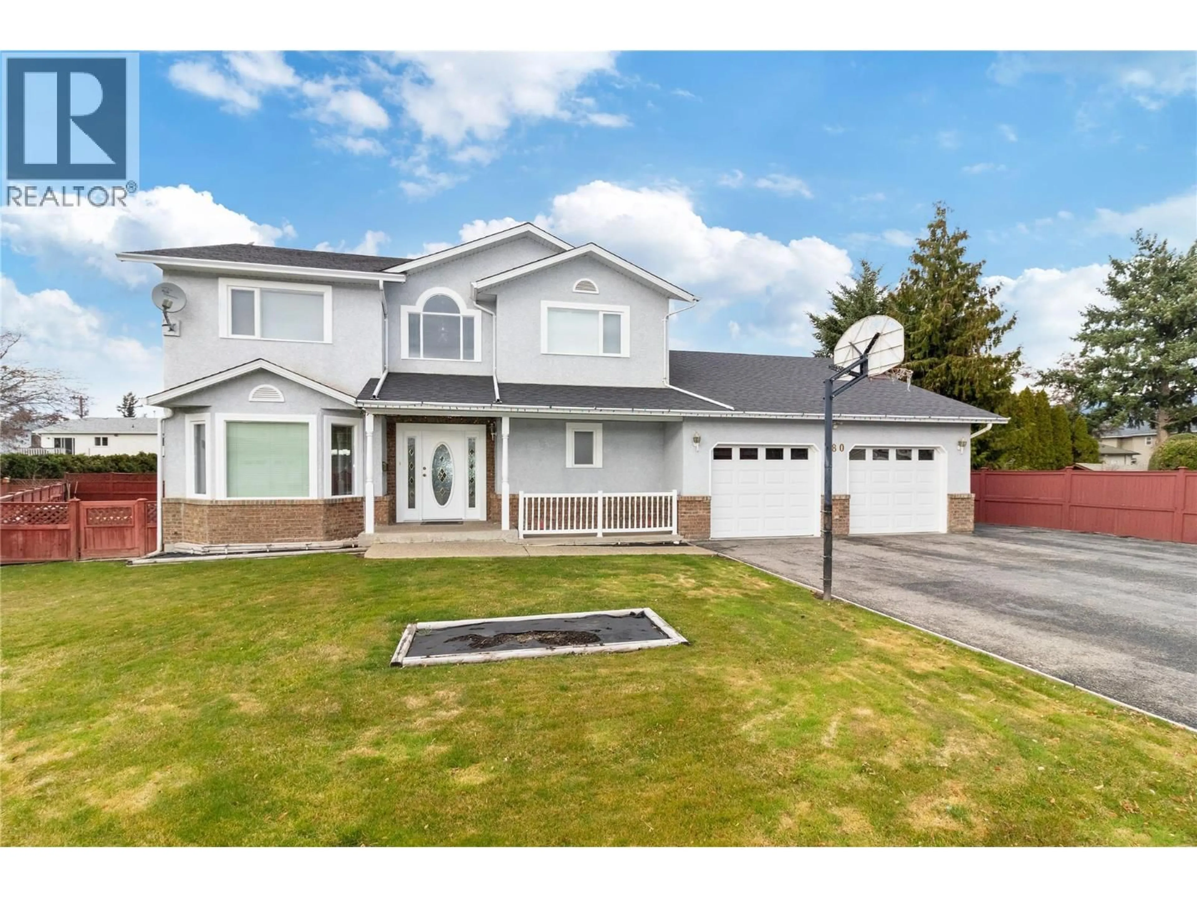 A pic from outside/outdoor area/front of a property/back of a property/a pic from drone, street for 680 RICHARDS ROAD, Kelowna British Columbia V1X2X6