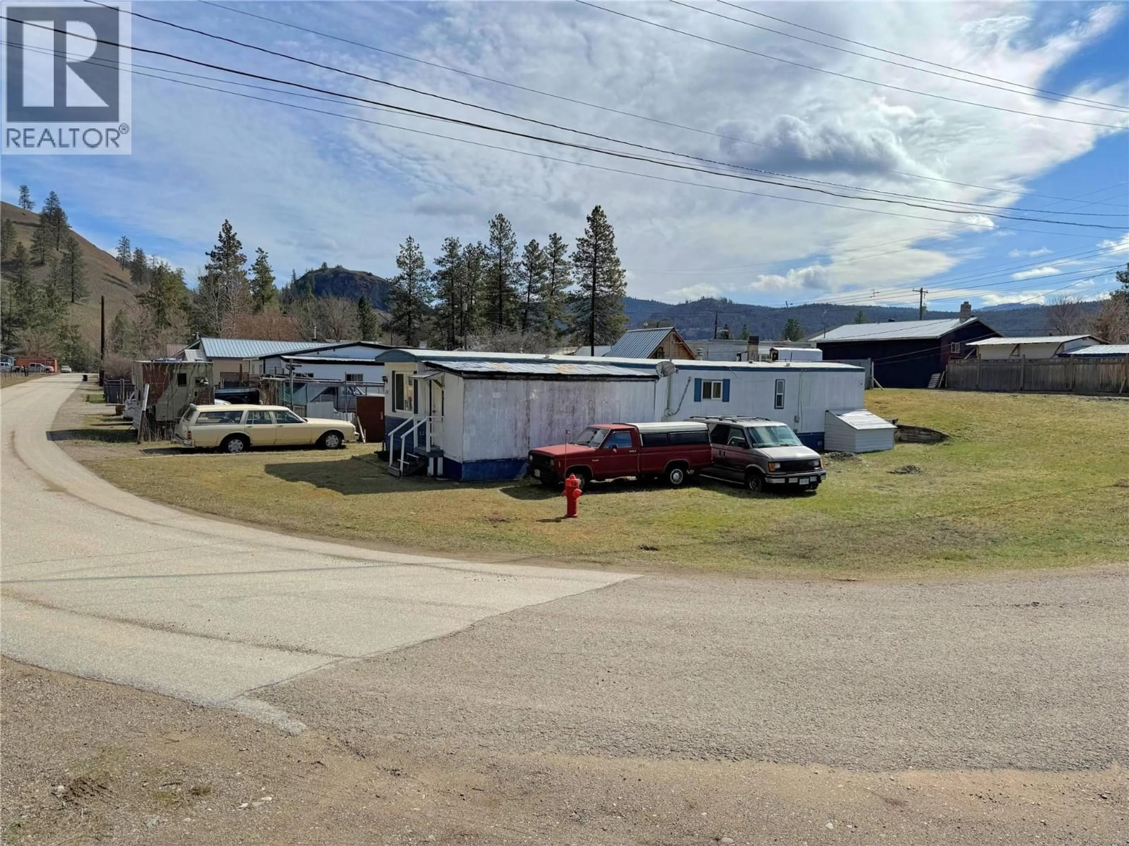 A pic from outside/outdoor area/front of a property/back of a property/a pic from drone, mountain view for 301 9TH AVENUE, Princeton British Columbia V0X1W0