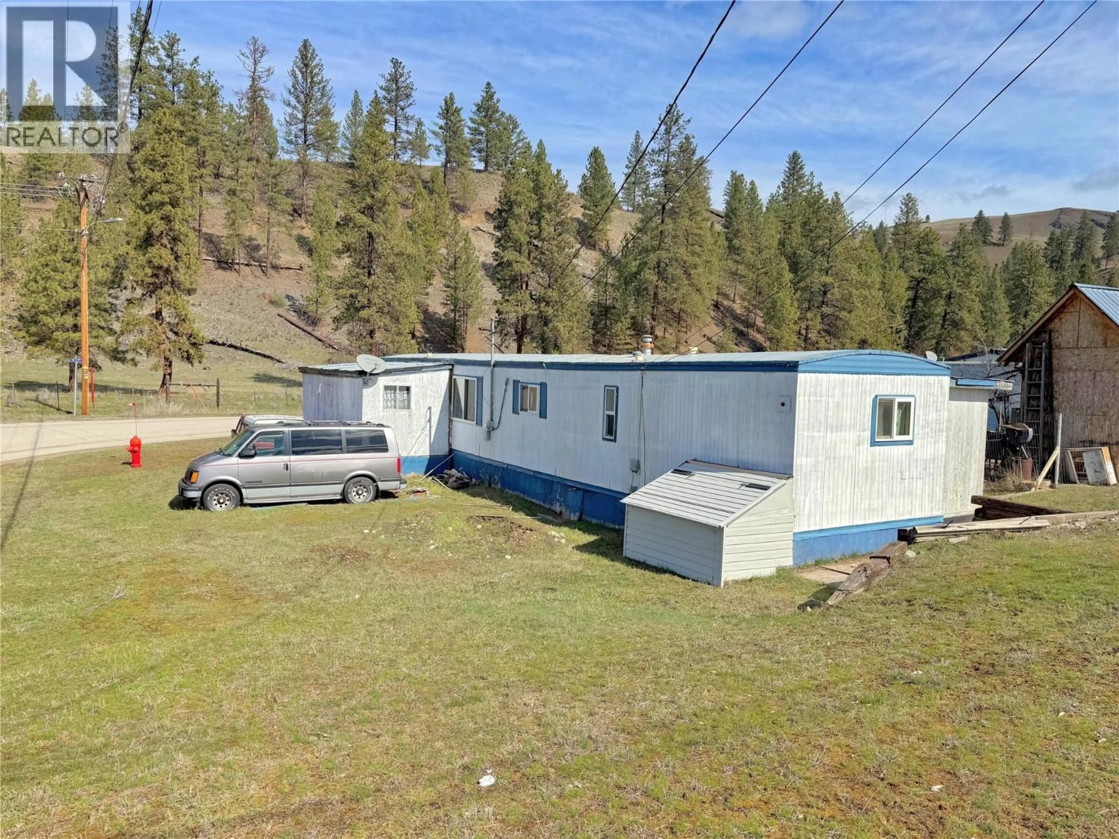 A pic from outside/outdoor area/front of a property/back of a property/a pic from drone, mountain view for 301 9TH AVENUE, Princeton British Columbia V0X1W0