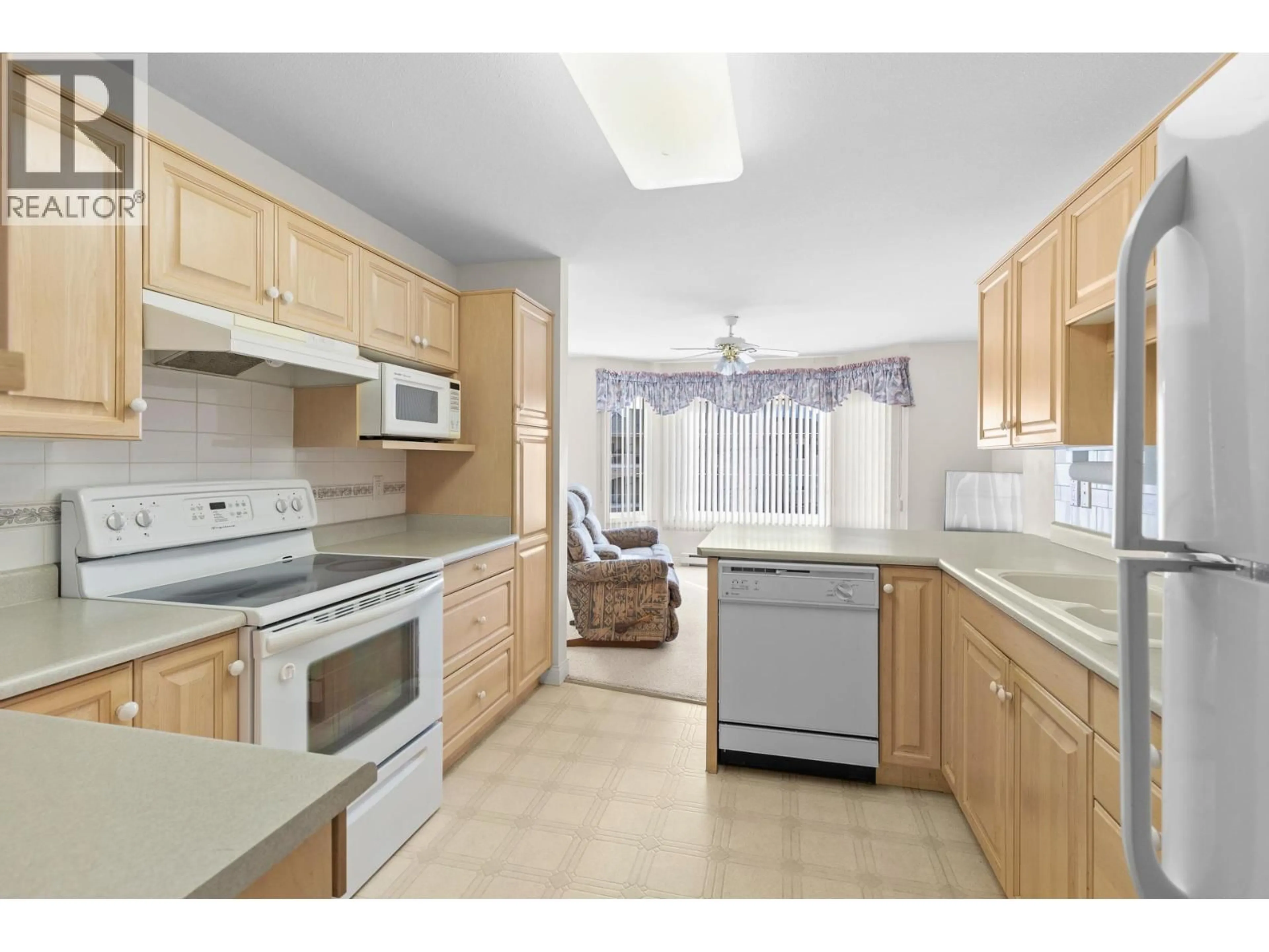 Standard kitchen, ceramic/tile floor for 202 - 3890 BROWN ROAD, West Kelowna British Columbia V4T2J5