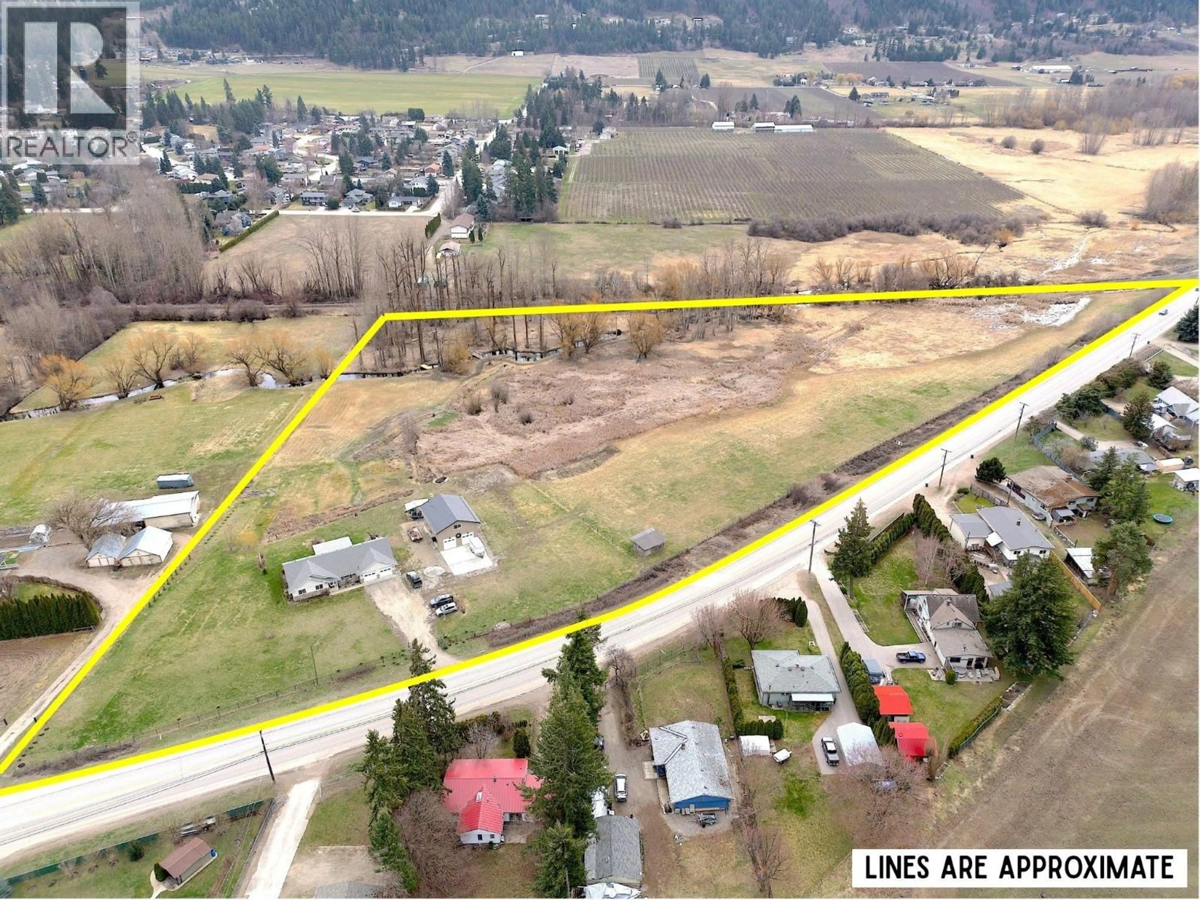 A pic from outside/outdoor area/front of a property/back of a property/a pic from drone, street for 6524 HIGHWAY 6 OTHER, Coldstream British Columbia V1B3C6