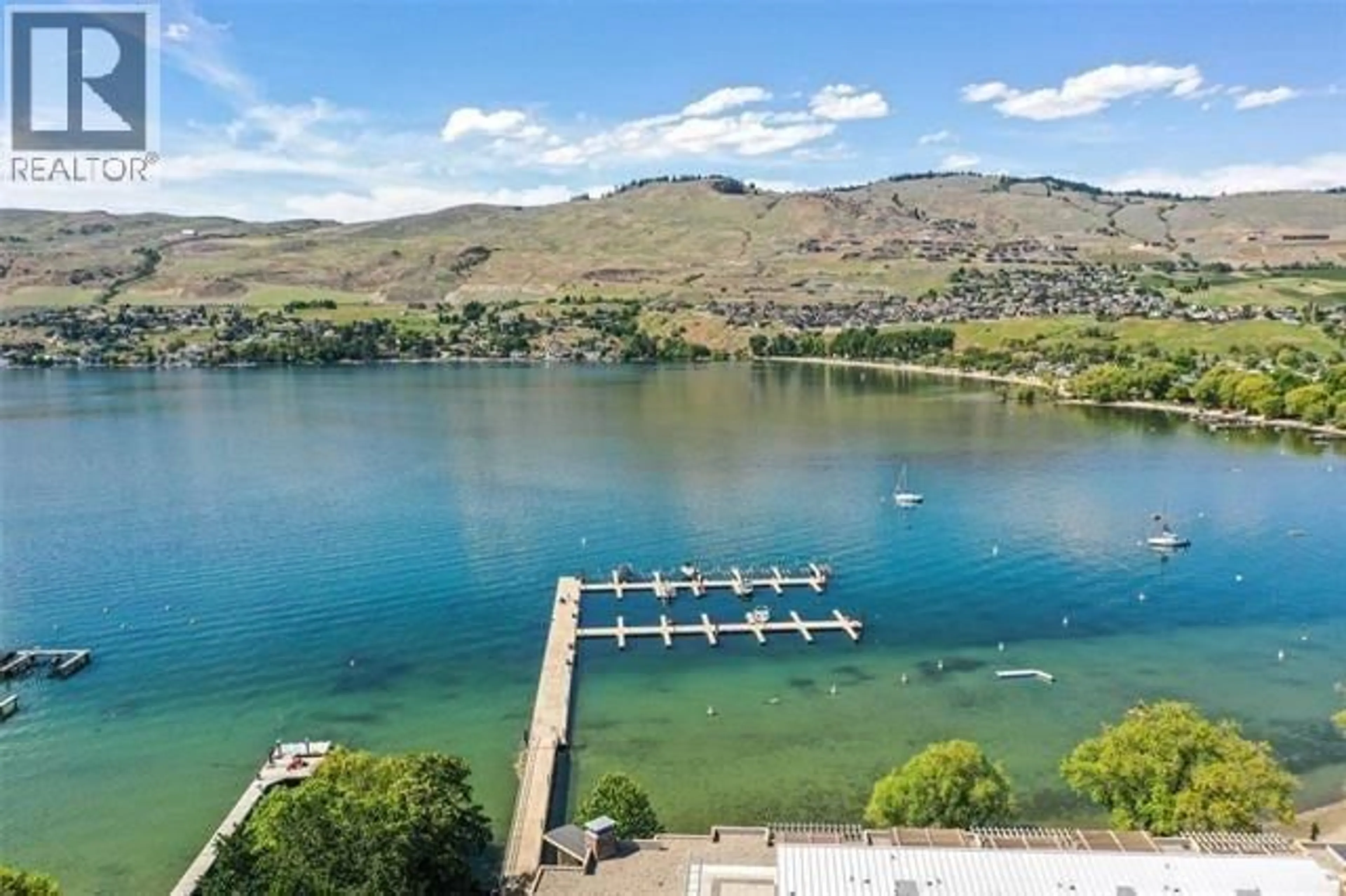 A pic from outside/outdoor area/front of a property/back of a property/a pic from drone, water/lake/river/ocean view for 1312 - 7343 OKANAGAN LANDING ROAD, Vernon British Columbia V1H2J6
