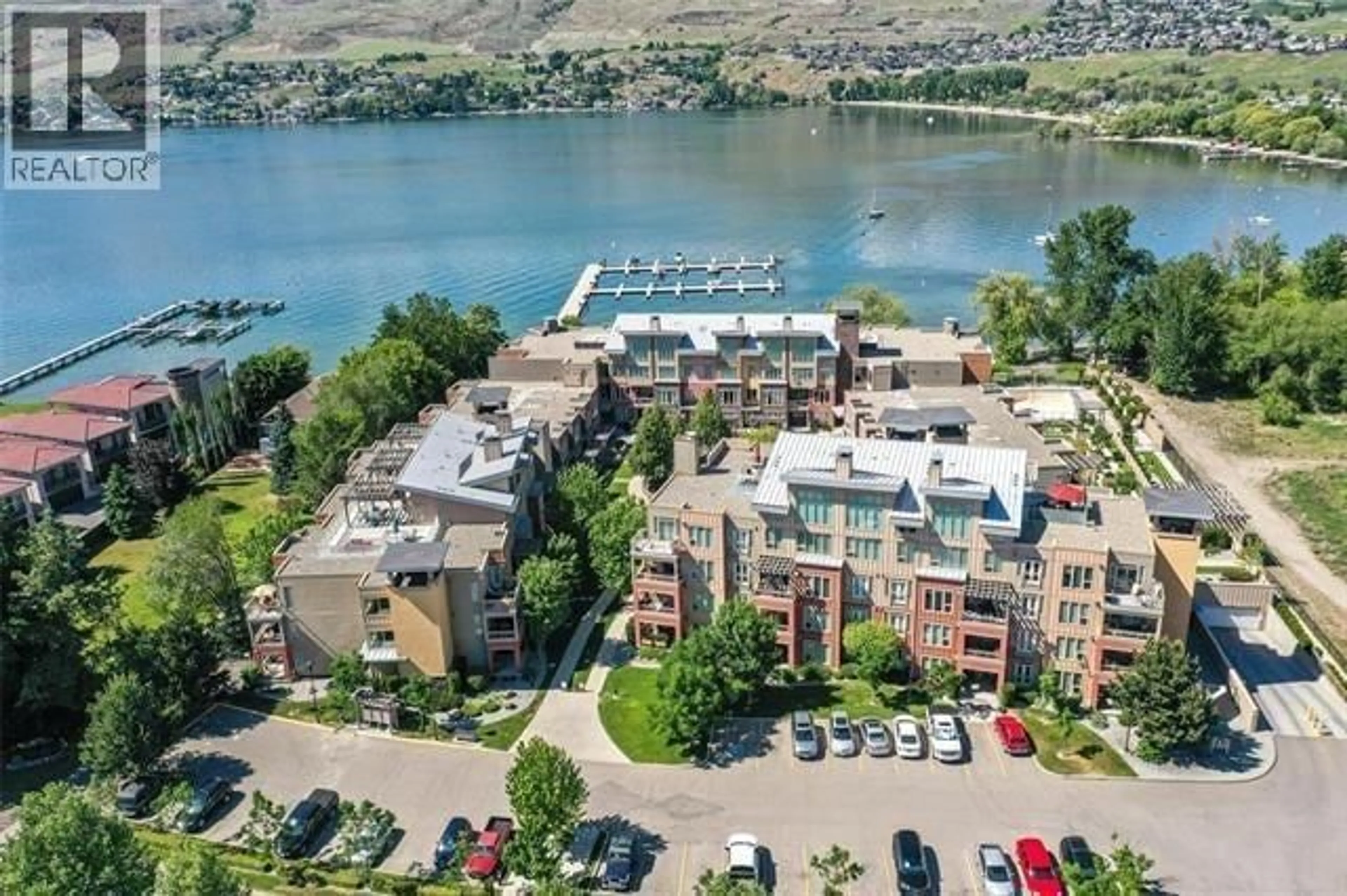 A pic from outside/outdoor area/front of a property/back of a property/a pic from drone, water/lake/river/ocean view for 1312 - 7343 OKANAGAN LANDING ROAD, Vernon British Columbia V1H2J6