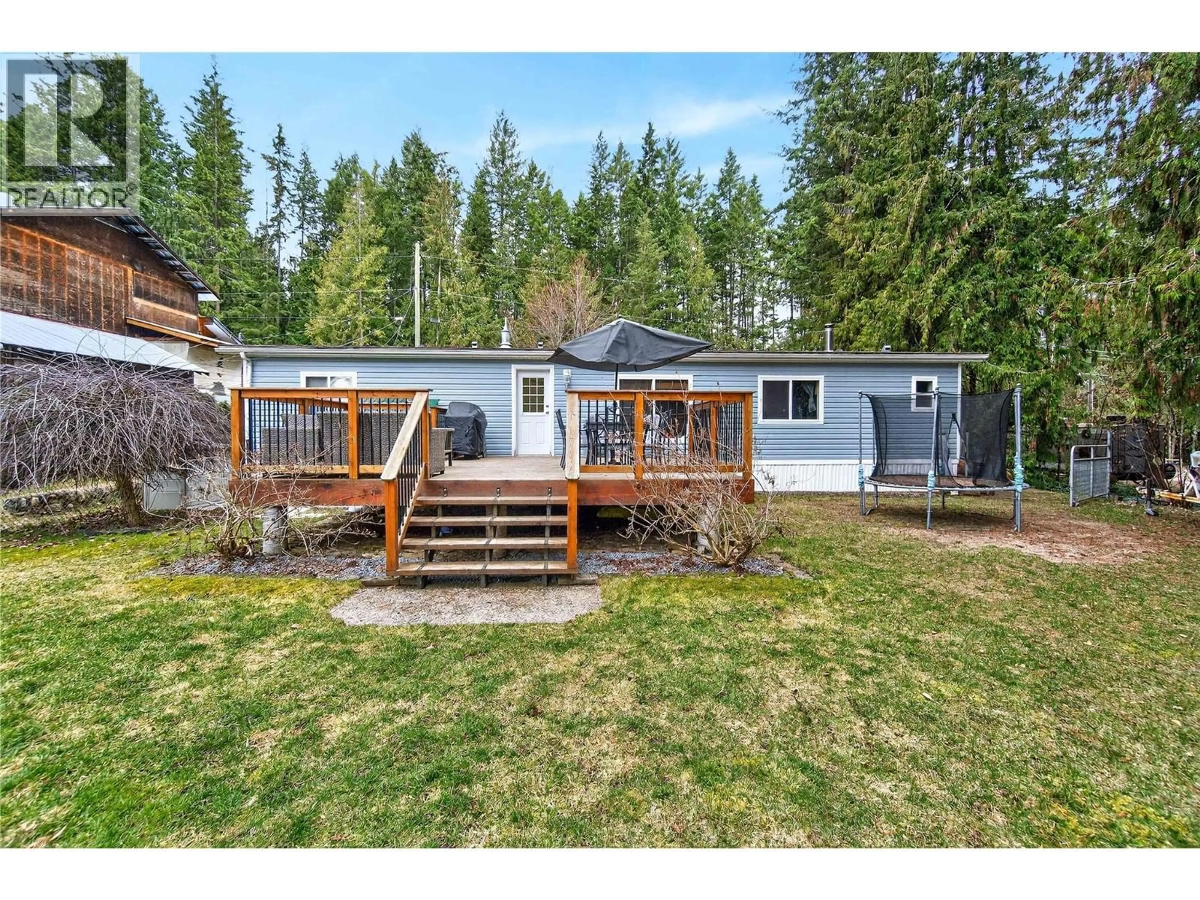 A pic from outside/outdoor area/front of a property/back of a property/a pic from drone, unknown for 19 WEST POIRIER ROAD, Mara British Columbia V0E2K0