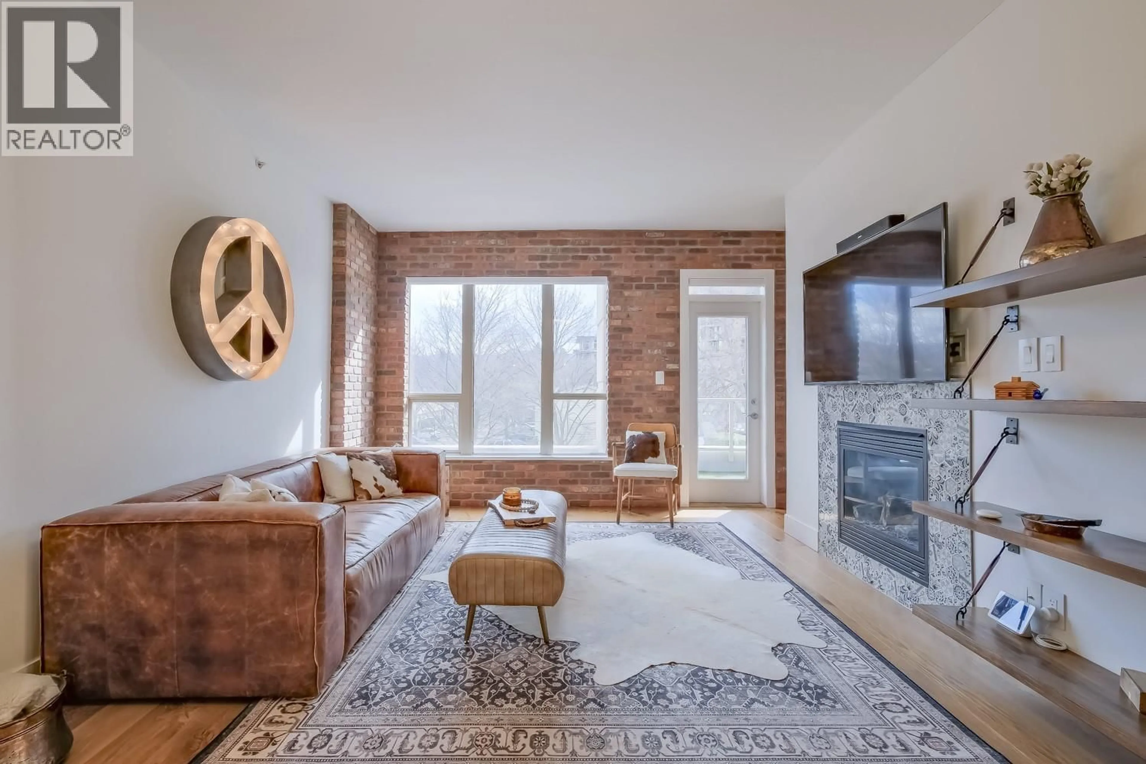 Living room with furniture, unknown for 215 - 1160 BERNARD AVENUE, Kelowna British Columbia V1Y6R2