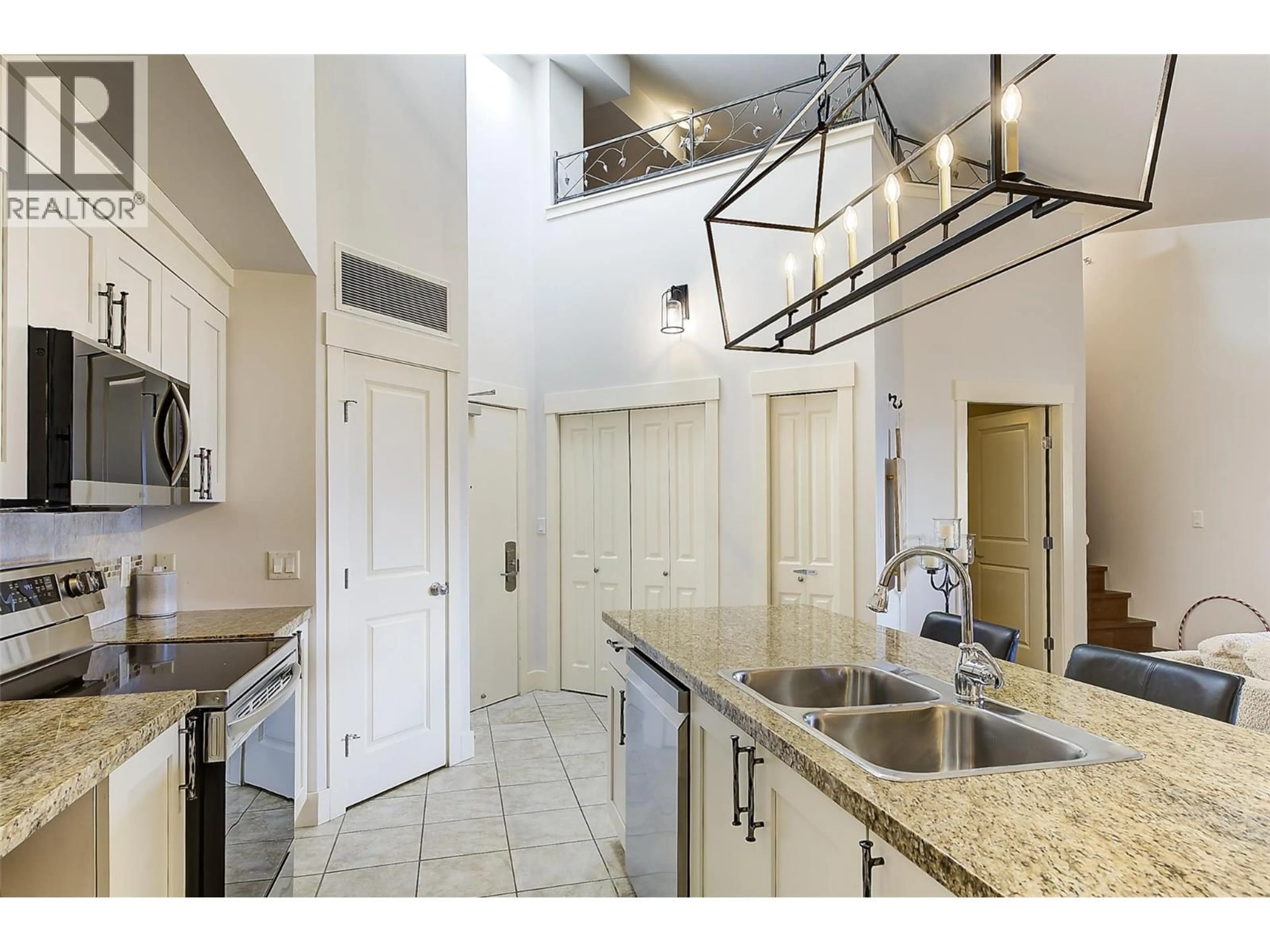 Open concept kitchen, ceramic/tile floor for 431 - 4205 GELLATLY ROAD, West Kelowna British Columbia V4T2K2