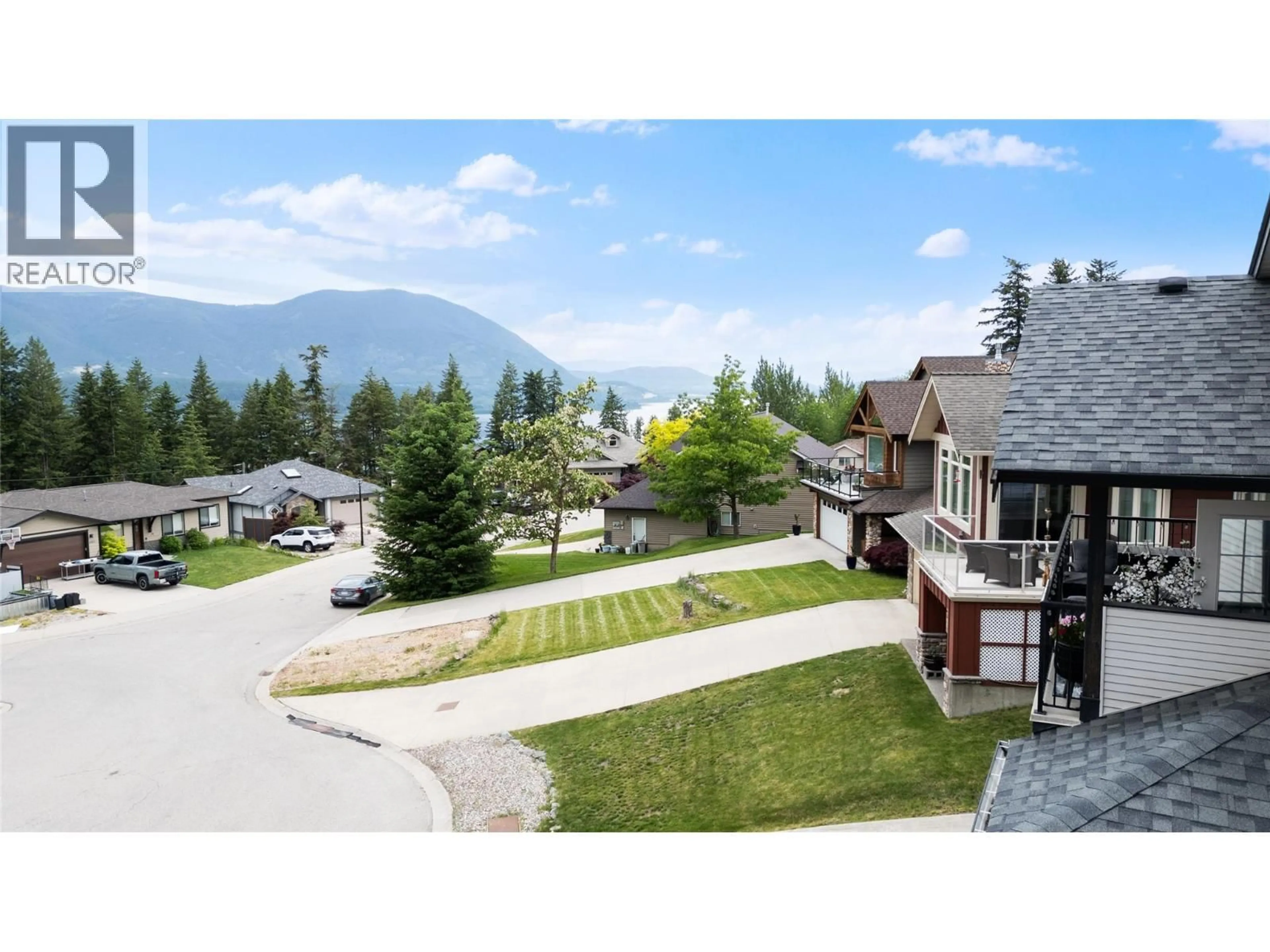 A pic from outside/outdoor area/front of a property/back of a property/a pic from drone, mountain view for 1040 14 AVENUE SOUTHEAST, Salmon Arm British Columbia V1E2R6
