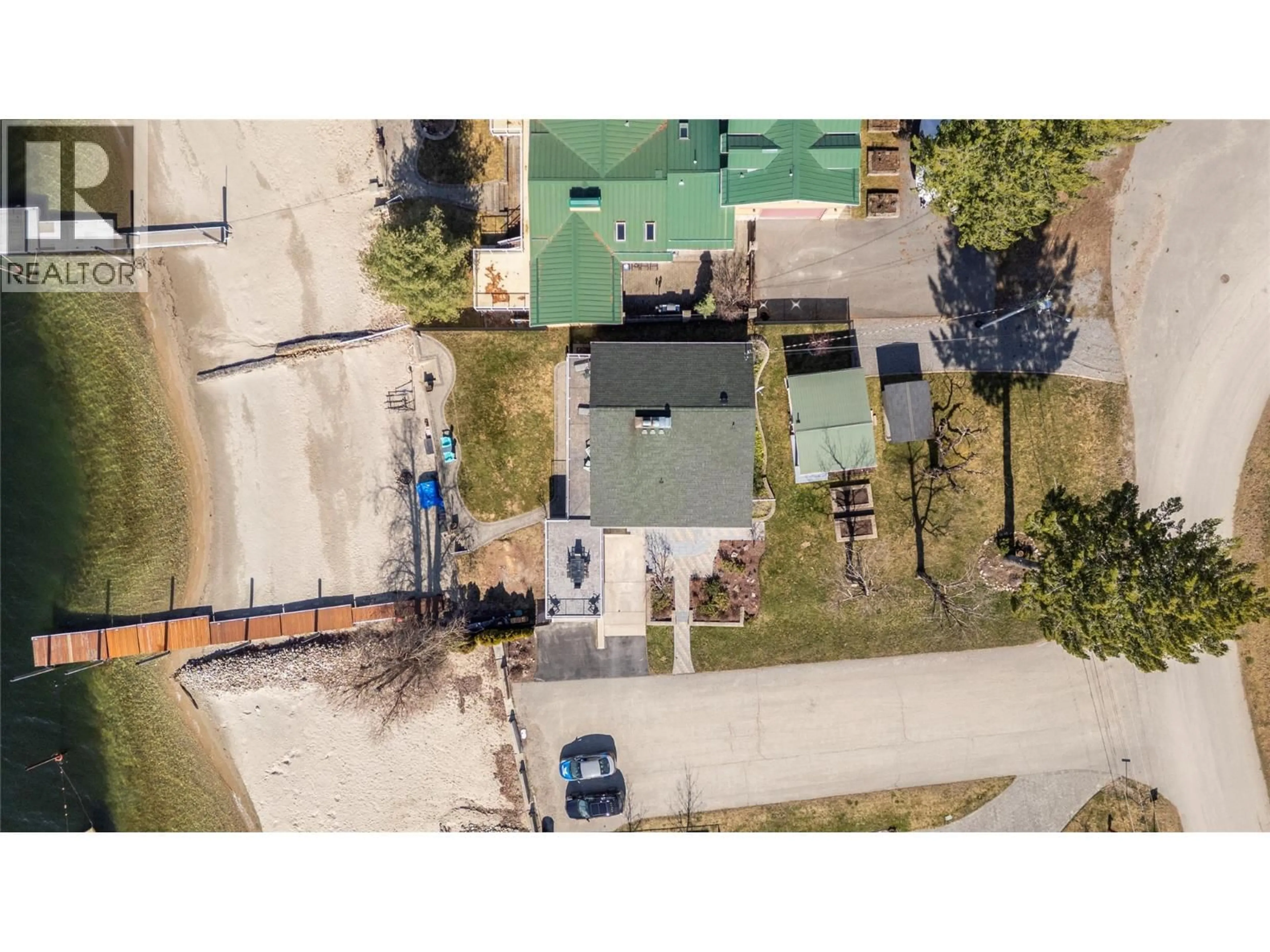 A pic from outside/outdoor area/front of a property/back of a property/a pic from drone, street for 82 MONTCALM CRESCENT, Sicamous British Columbia V0E2V1