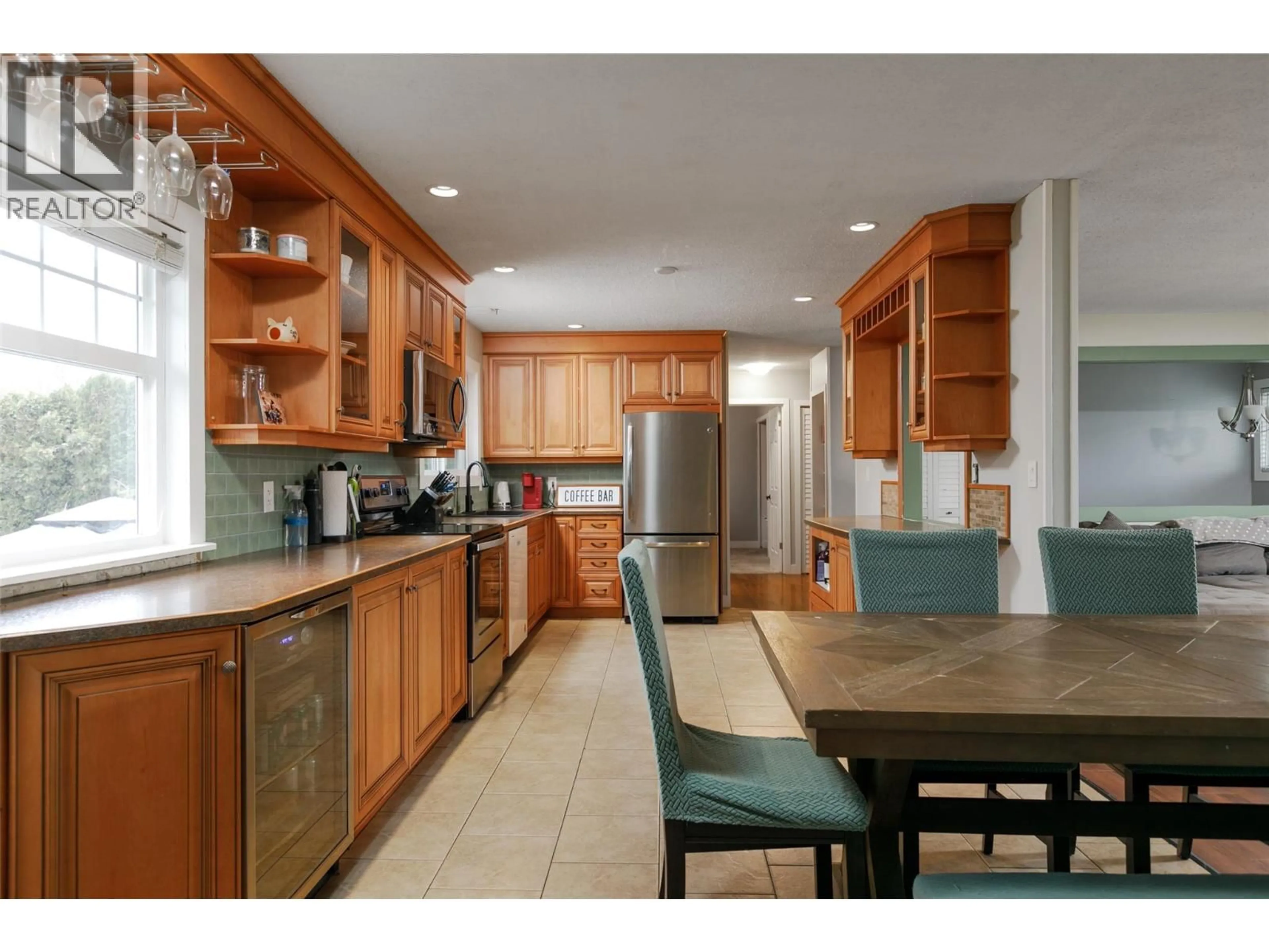 Open concept kitchen, ceramic/tile floor for 340 PATTERSON ROAD, Kelowna British Columbia V1X2L2