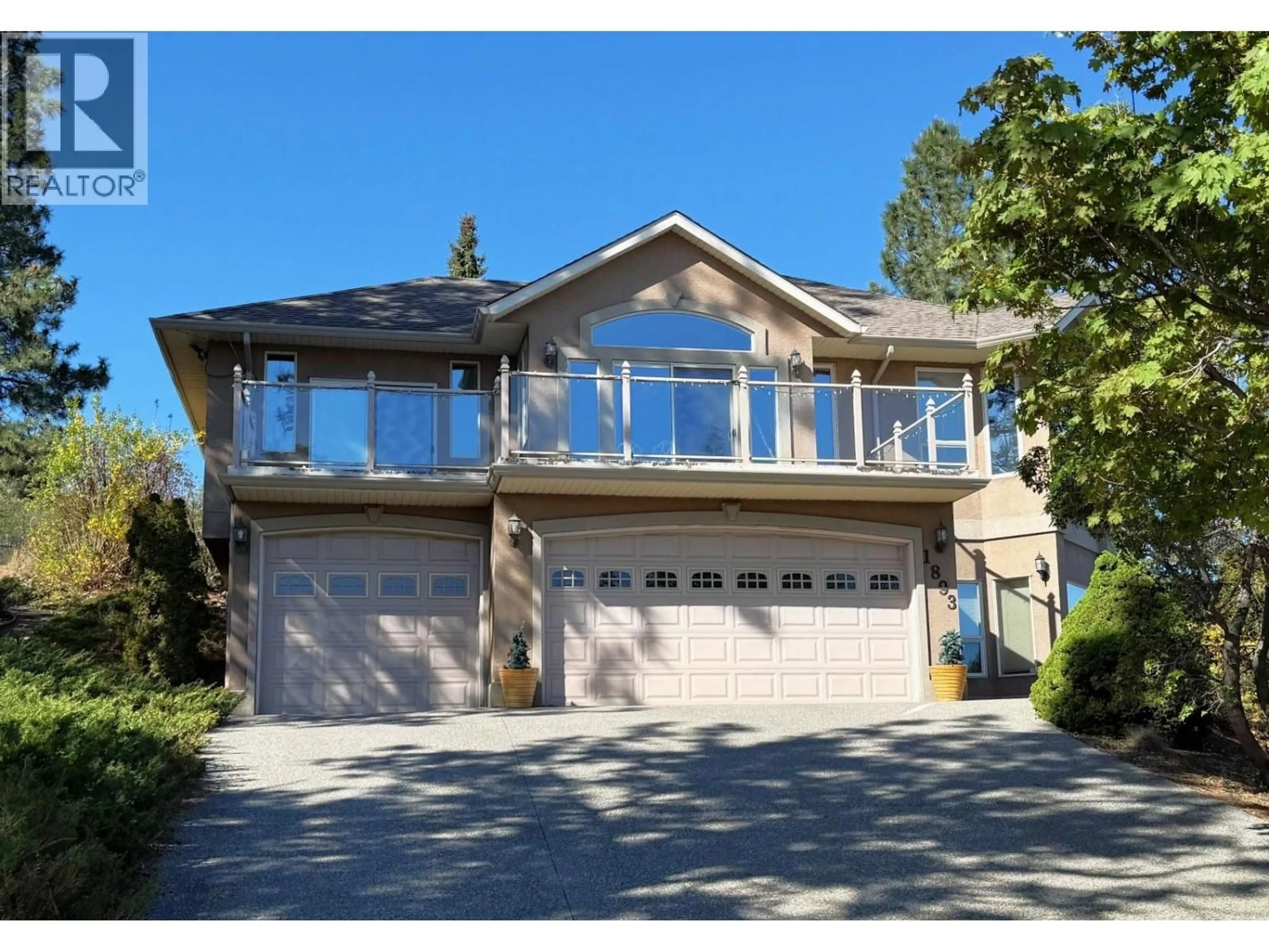 Home with vinyl exterior material, street for 1893 MCKINLEY COURT, Kamloops British Columbia V2E2L9