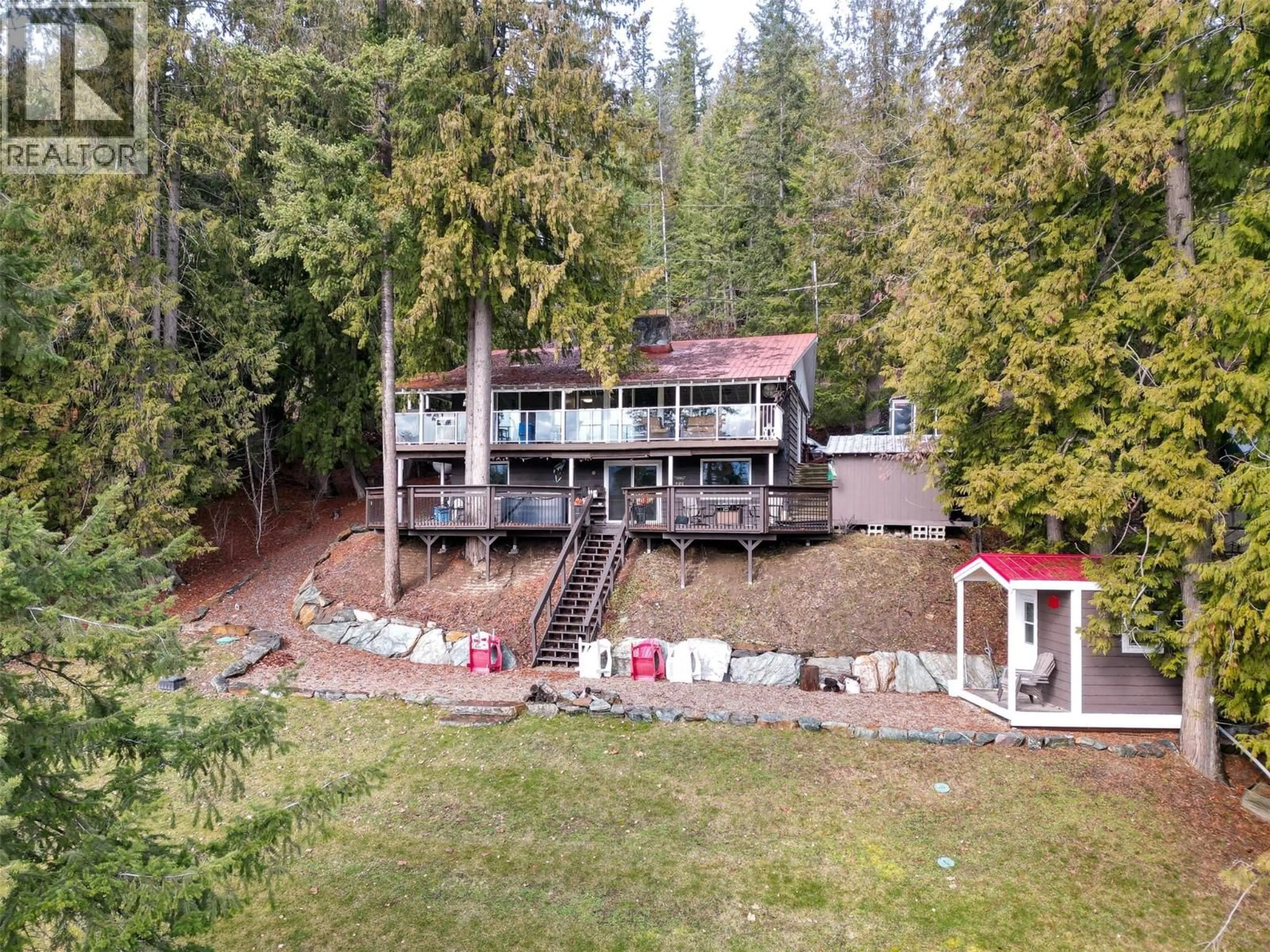 A pic from outside/outdoor area/front of a property/back of a property/a pic from drone, water/lake/river/ocean view for 7796 COLUMBIA DRIVE, Anglemont British Columbia V0E1M8
