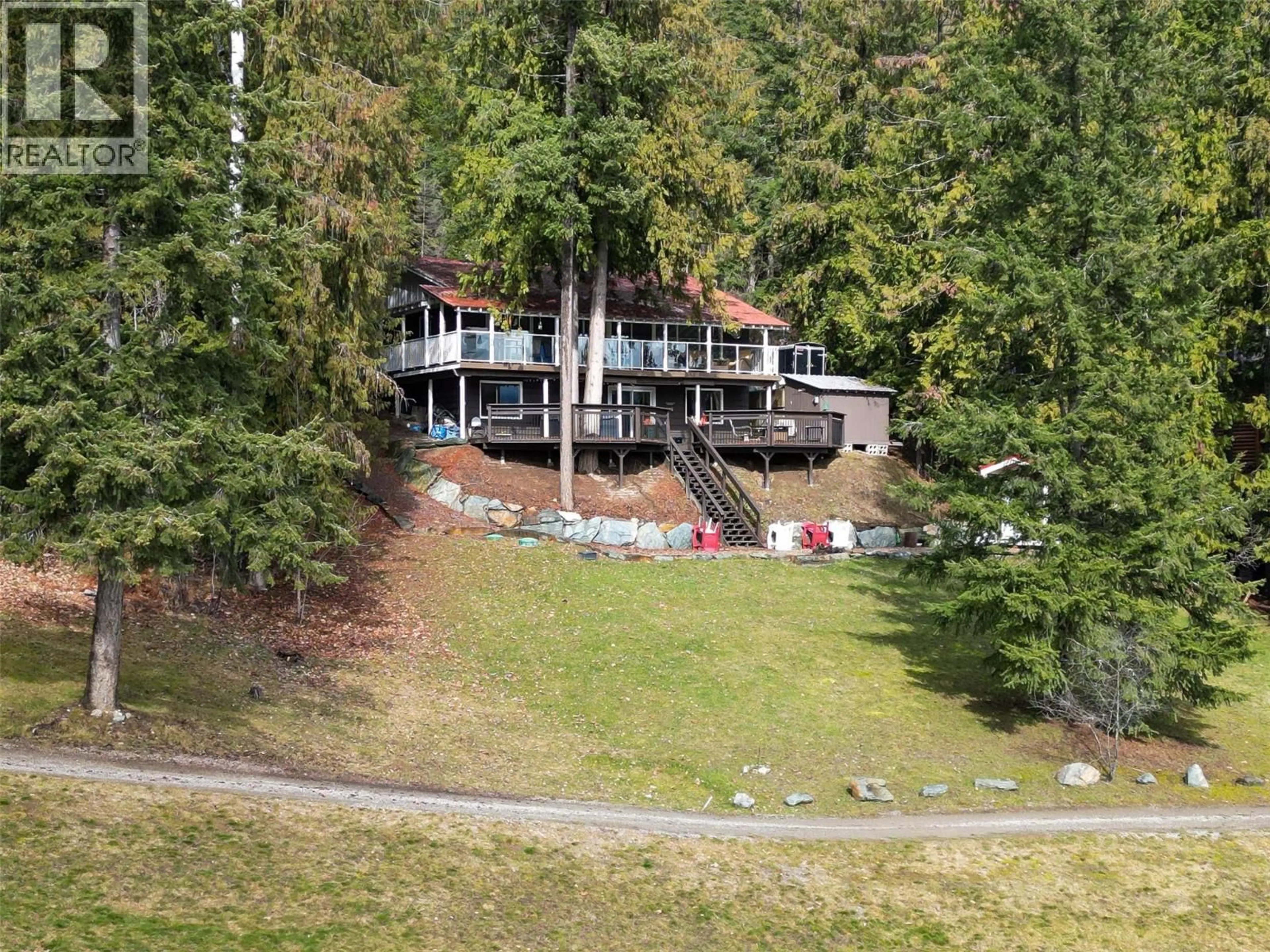 A pic from outside/outdoor area/front of a property/back of a property/a pic from drone, water/lake/river/ocean view for 7796 COLUMBIA DRIVE, Anglemont British Columbia V0E1M8