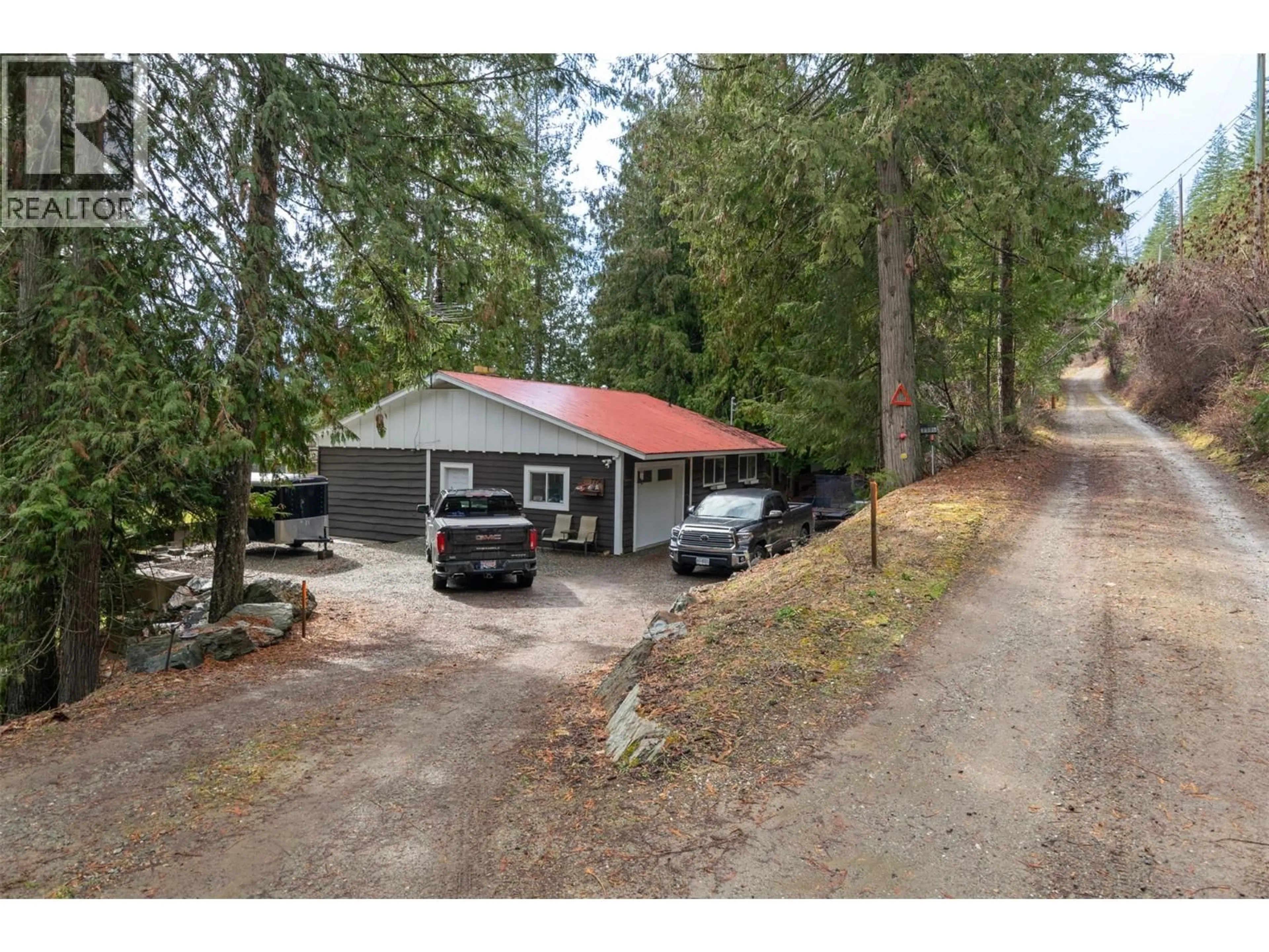 A pic from outside/outdoor area/front of a property/back of a property/a pic from drone, street for 7796 COLUMBIA DRIVE, Anglemont British Columbia V0E1M8
