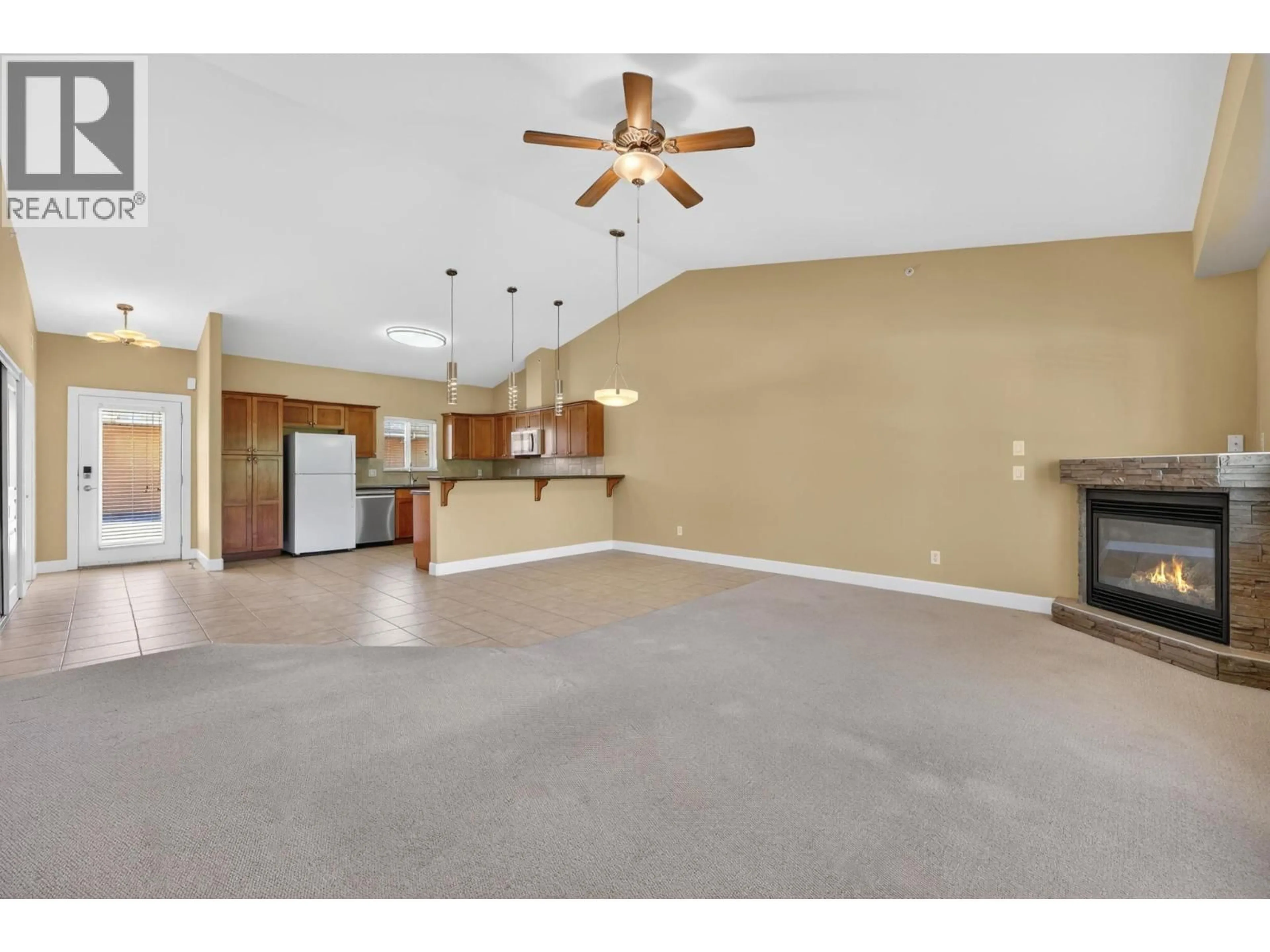 Open concept kitchen, unknown for 337 - 3996 BEACH AVENUE, Peachland British Columbia V0H1X5