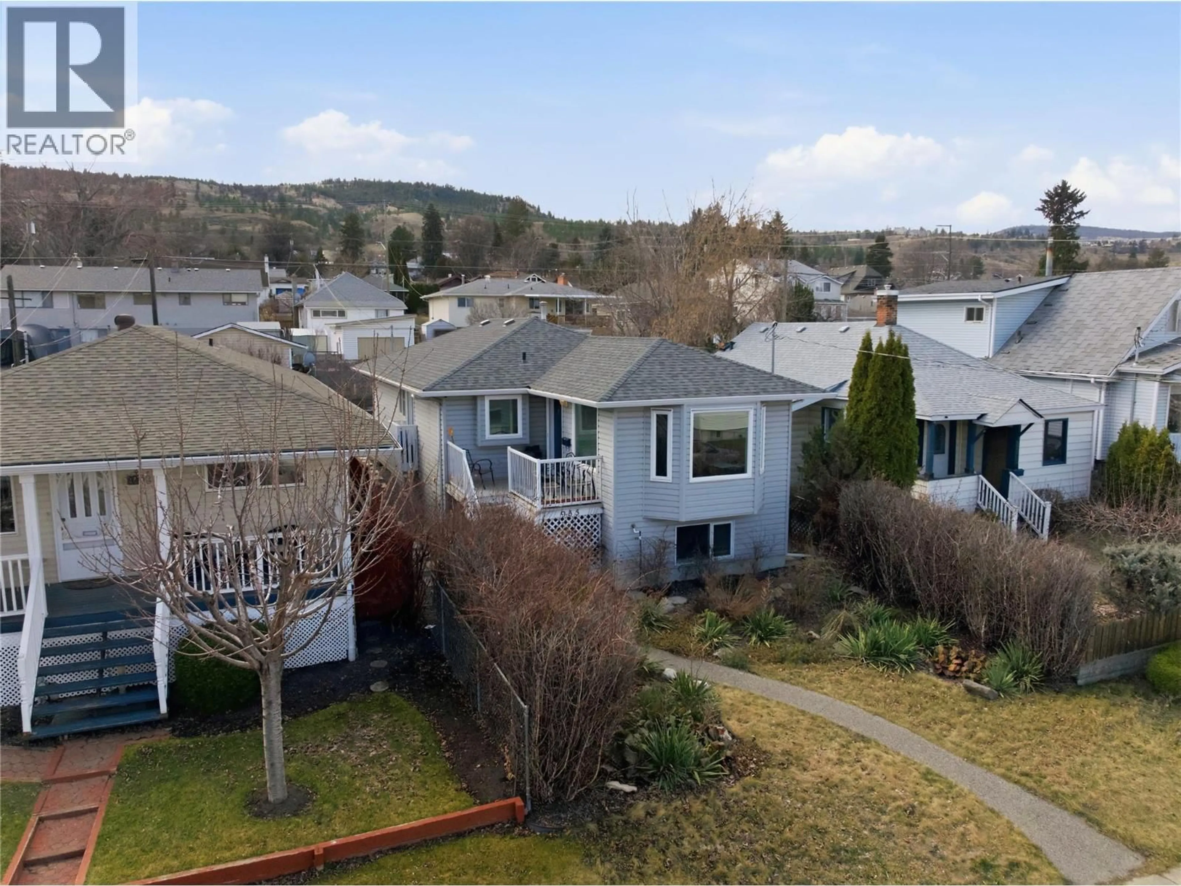 A pic from outside/outdoor area/front of a property/back of a property/a pic from drone, mountain view for 935 DOMINION STREET, Kamloops British Columbia V2C2Y3