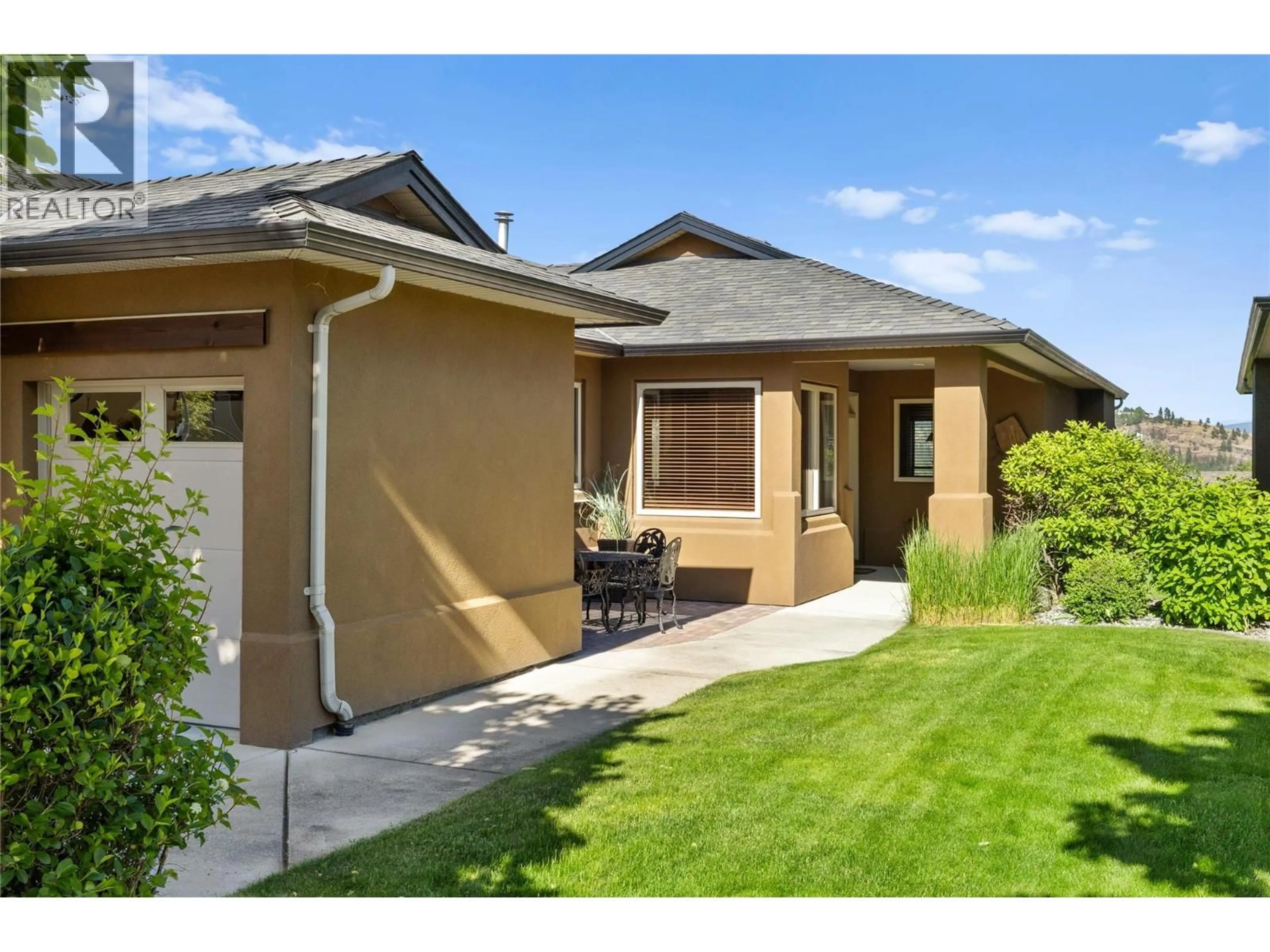 Home with vinyl exterior material, street for 3694 SONOMA PINES DRIVE, Westbank British Columbia V4T2Y2