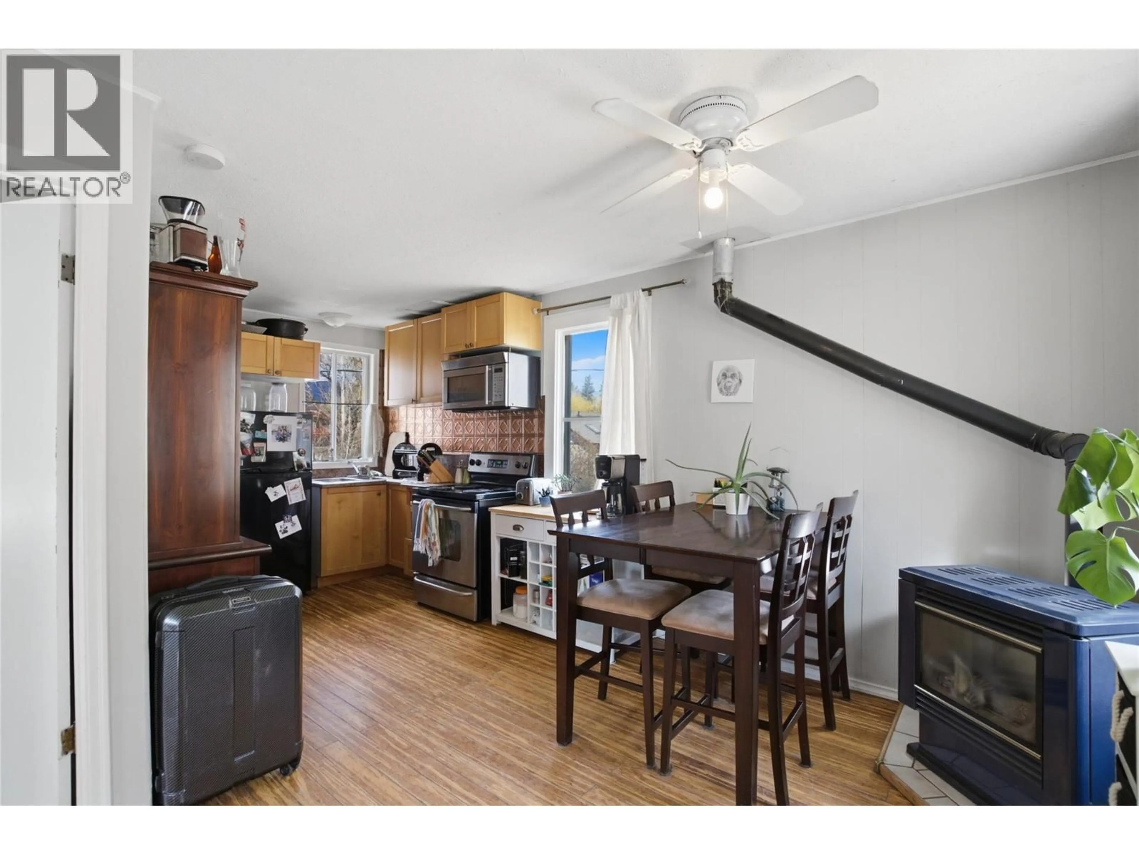 Open concept kitchen, wood/laminate floor for 1915 SHUMWAY ROAD, Kamloops British Columbia V2C6T7