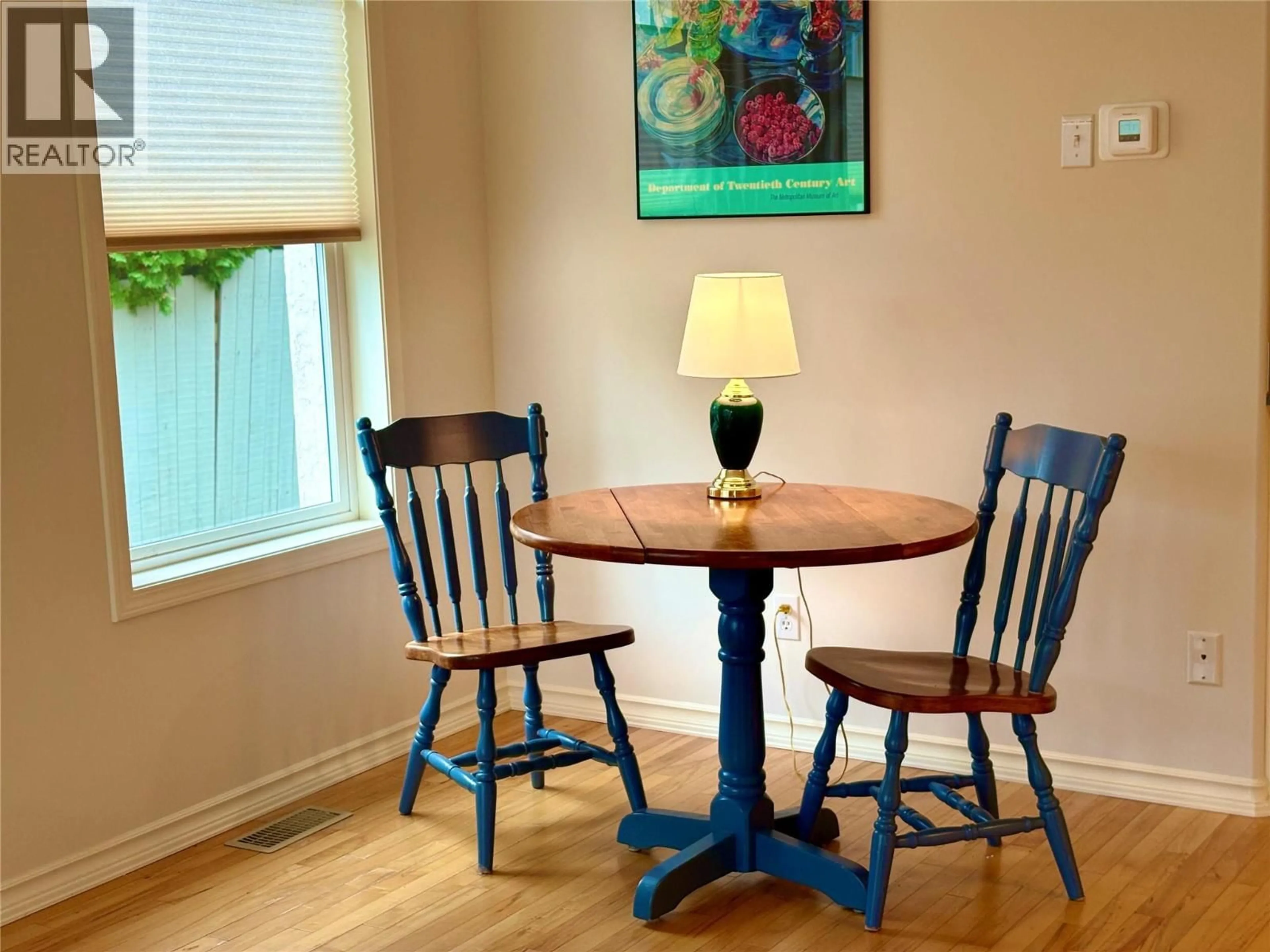 Dining room, wood/laminate floor for 422 BEASLEY WEST CRESCENT, Nelson British Columbia V1L5Y4