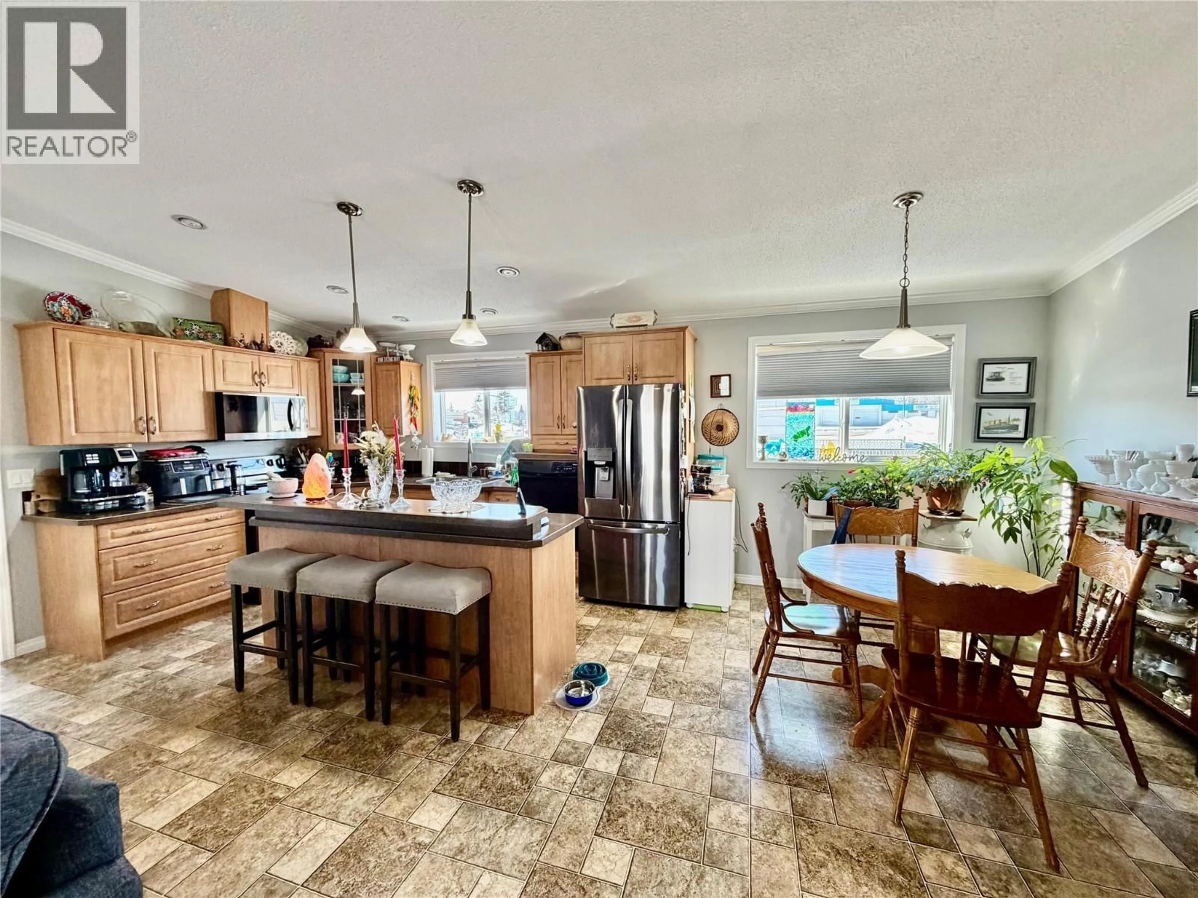 Open concept kitchen, ceramic/tile floor for 720 105 AVENUE, Dawson Creek British Columbia V1G2K6