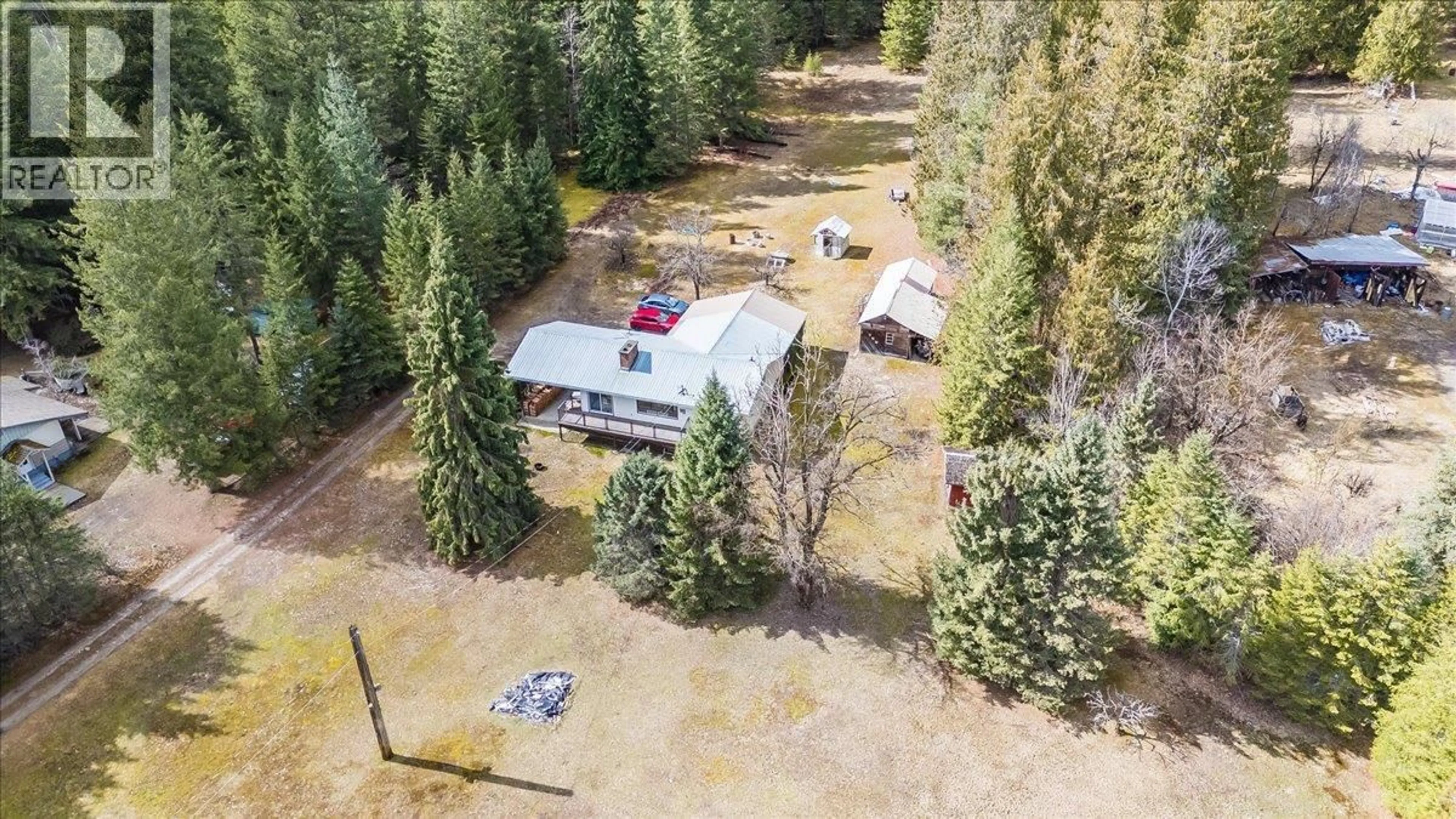 A pic from outside/outdoor area/front of a property/back of a property/a pic from drone, forest/trees view for 5641 SLOCAN RIVER ROAD, Winlaw British Columbia V0G2J0
