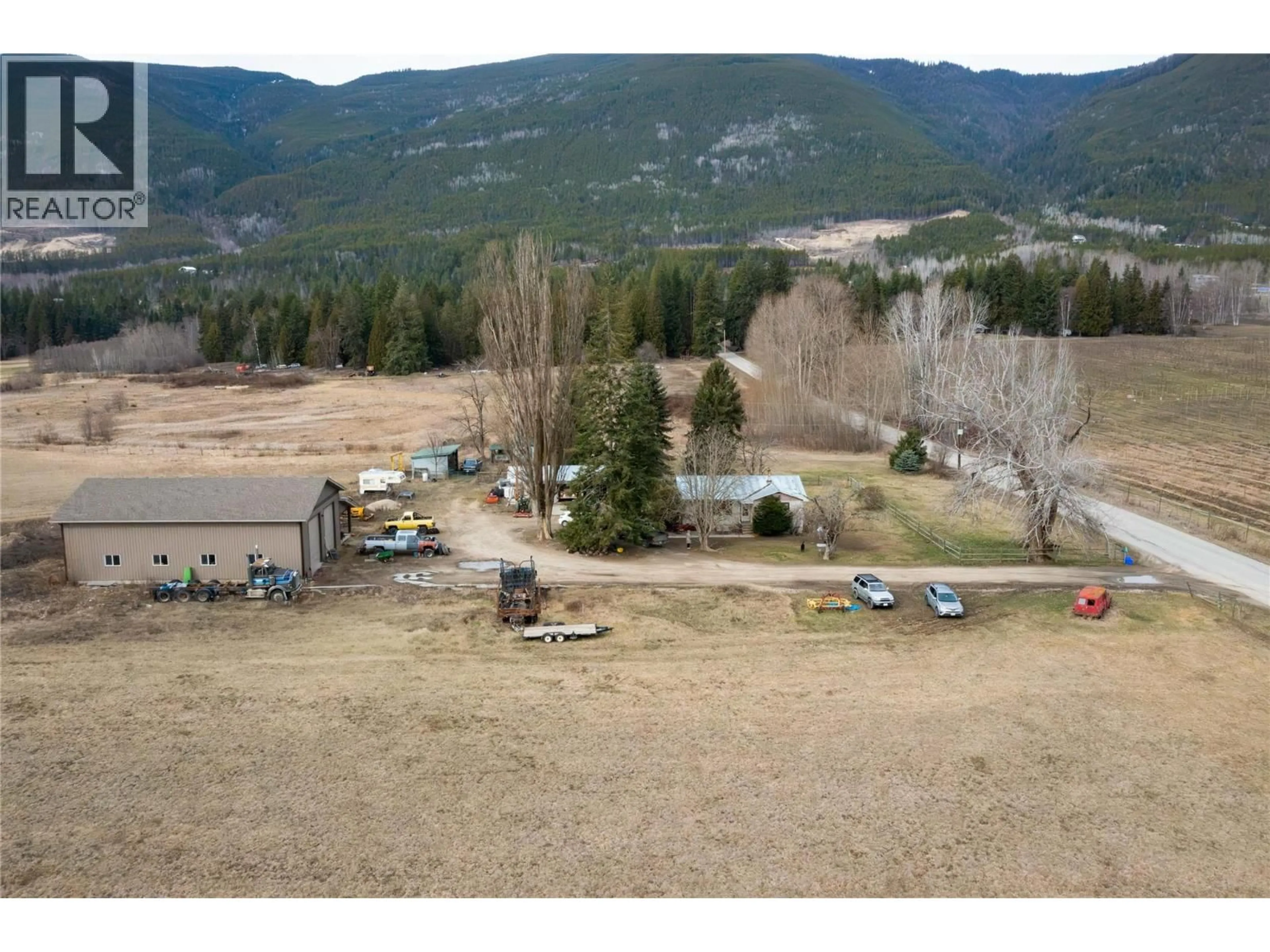A pic from outside/outdoor area/front of a property/back of a property/a pic from drone, mountain view for 5311 30 AVENUE NORTHWEST, Salmon Arm British Columbia V1E3A9