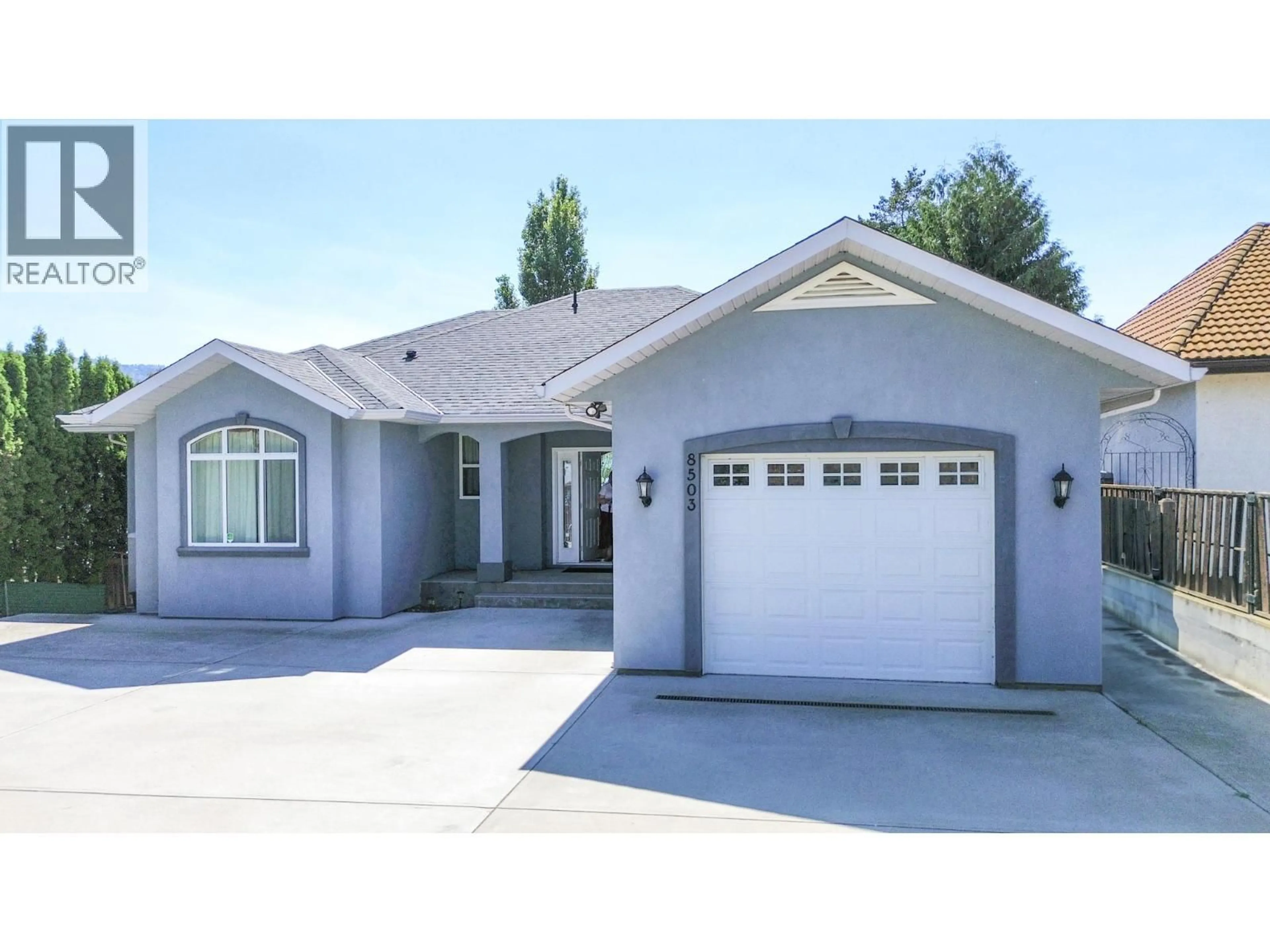 Home with vinyl exterior material, street for 8503 KINGFISHER DRIVE, Osoyoos British Columbia V0H1V1