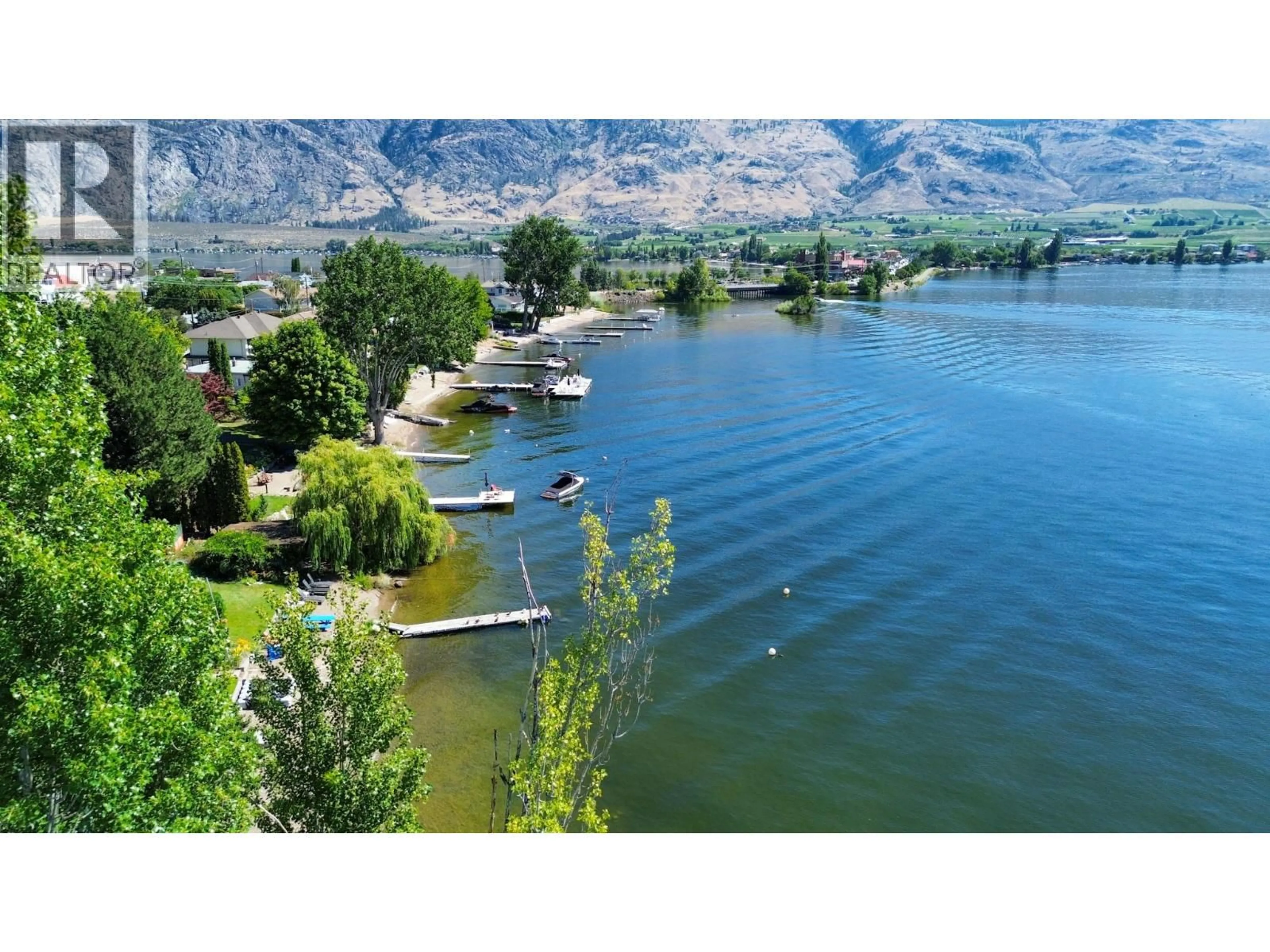 A pic from outside/outdoor area/front of a property/back of a property/a pic from drone, water/lake/river/ocean view for 8503 KINGFISHER DRIVE, Osoyoos British Columbia V0H1V1