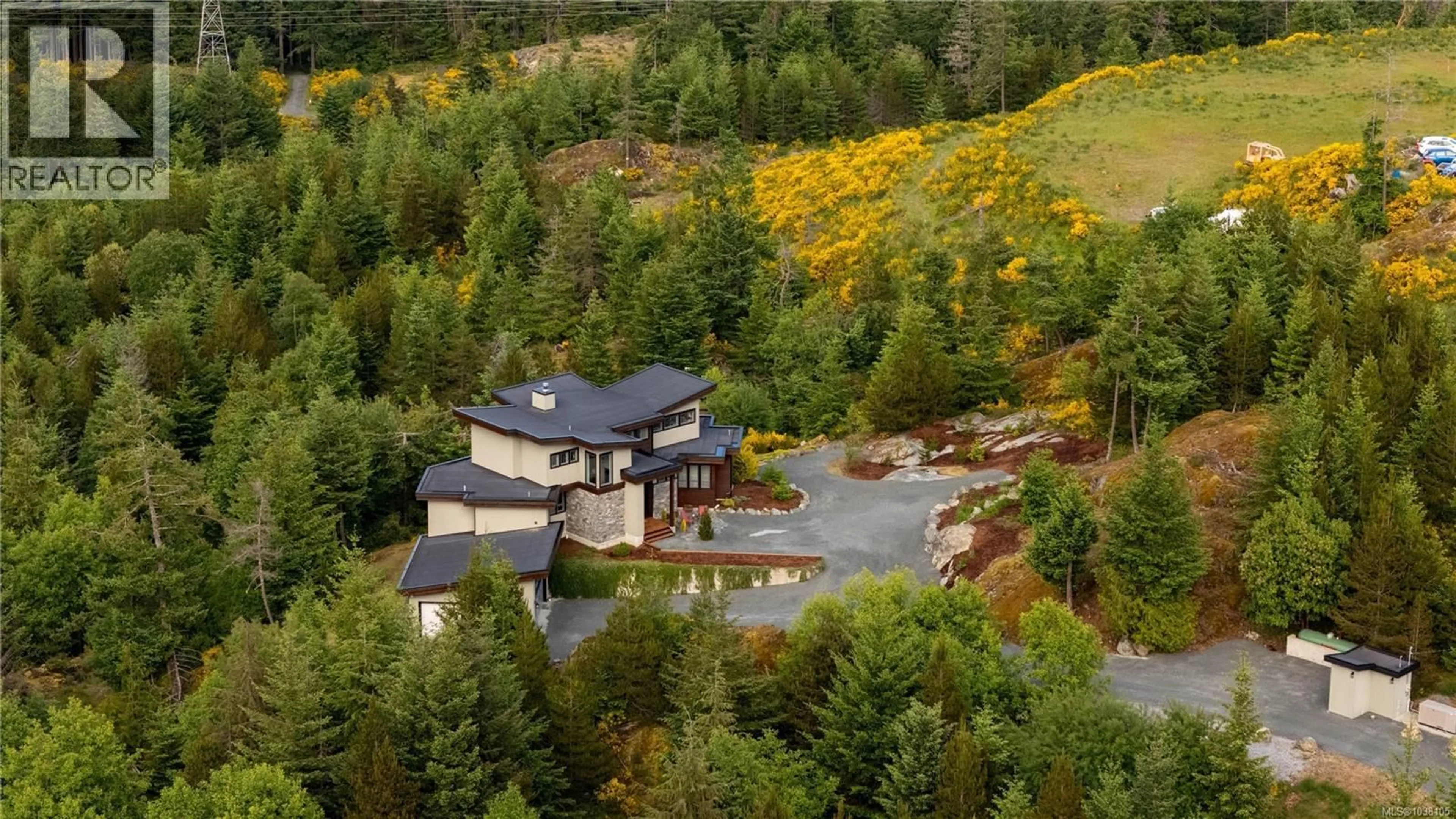 A pic from outside/outdoor area/front of a property/back of a property/a pic from drone, unknown for 1150 STONECREST WAY, Shawnigan Lake British Columbia V8H2J1