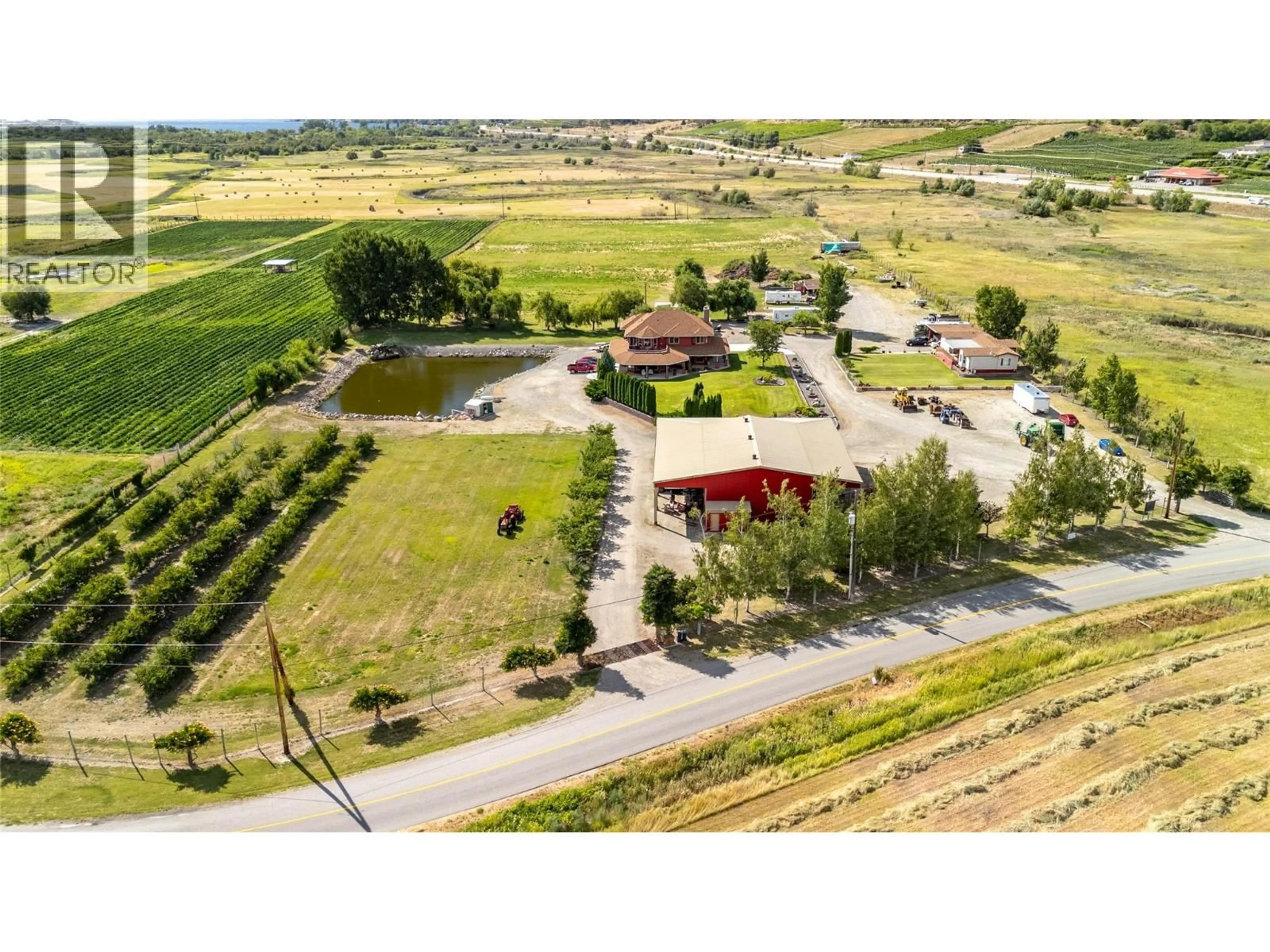 A pic from outside/outdoor area/front of a property/back of a property/a pic from drone, unknown for 8705 ROAD 22 ROAD, Oliver British Columbia V0H1T1