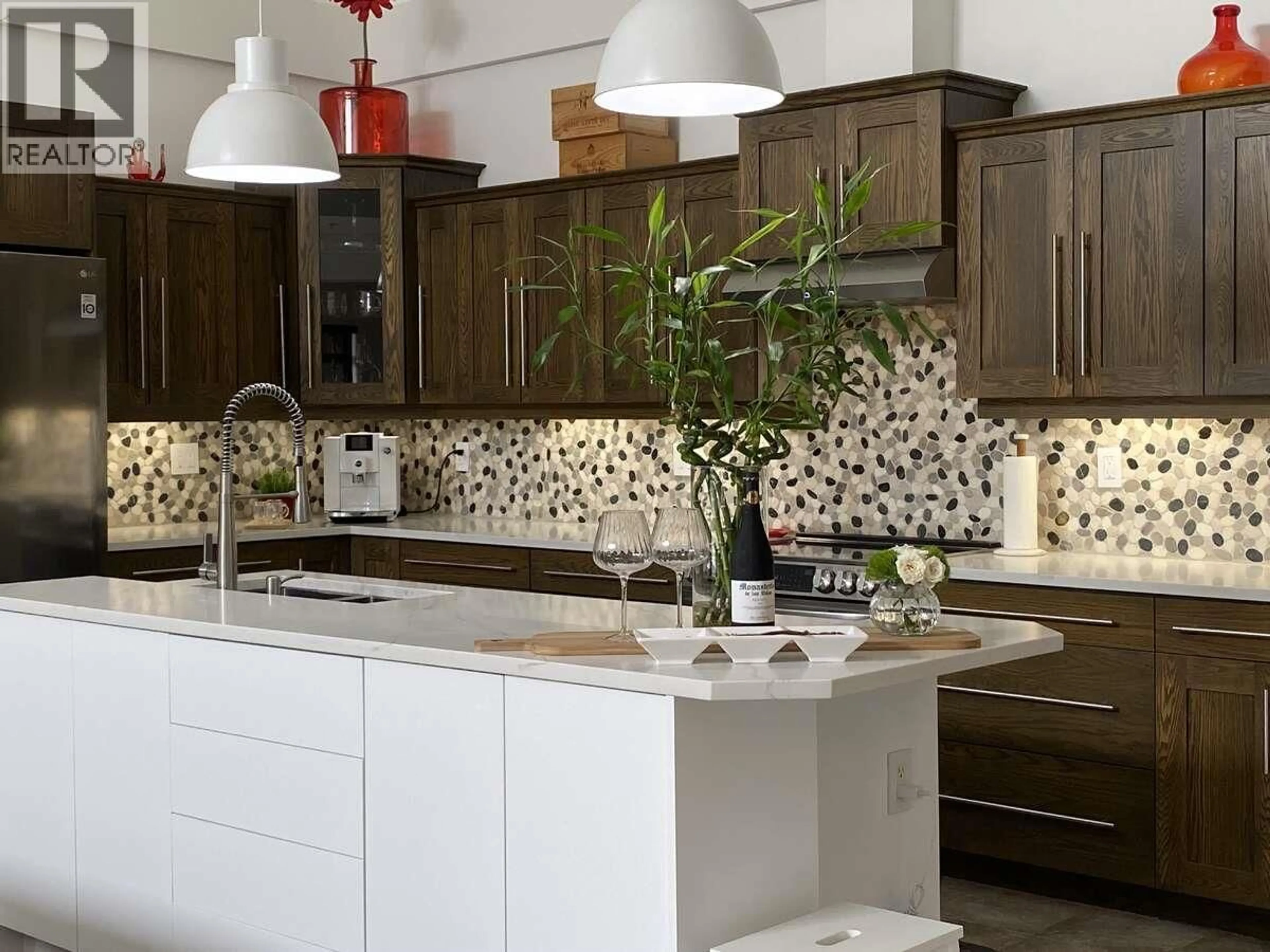 Contemporary kitchen, ceramic/tile floor for 307 - 1905 PANDOSY STREET, Kelowna British Columbia V1Y1R8