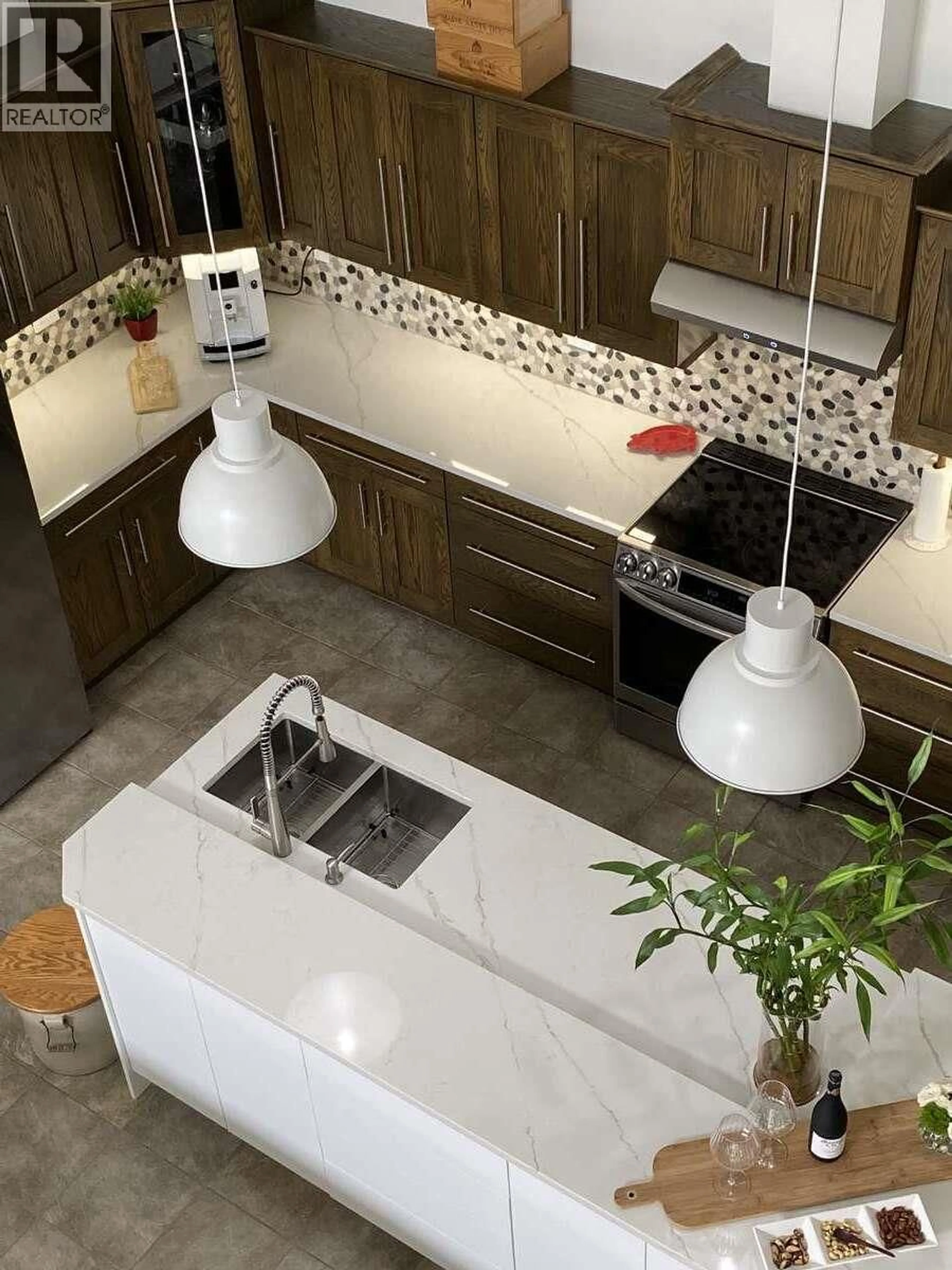 Contemporary kitchen, ceramic/tile floor for 307 - 1905 PANDOSY STREET, Kelowna British Columbia V1Y1R8